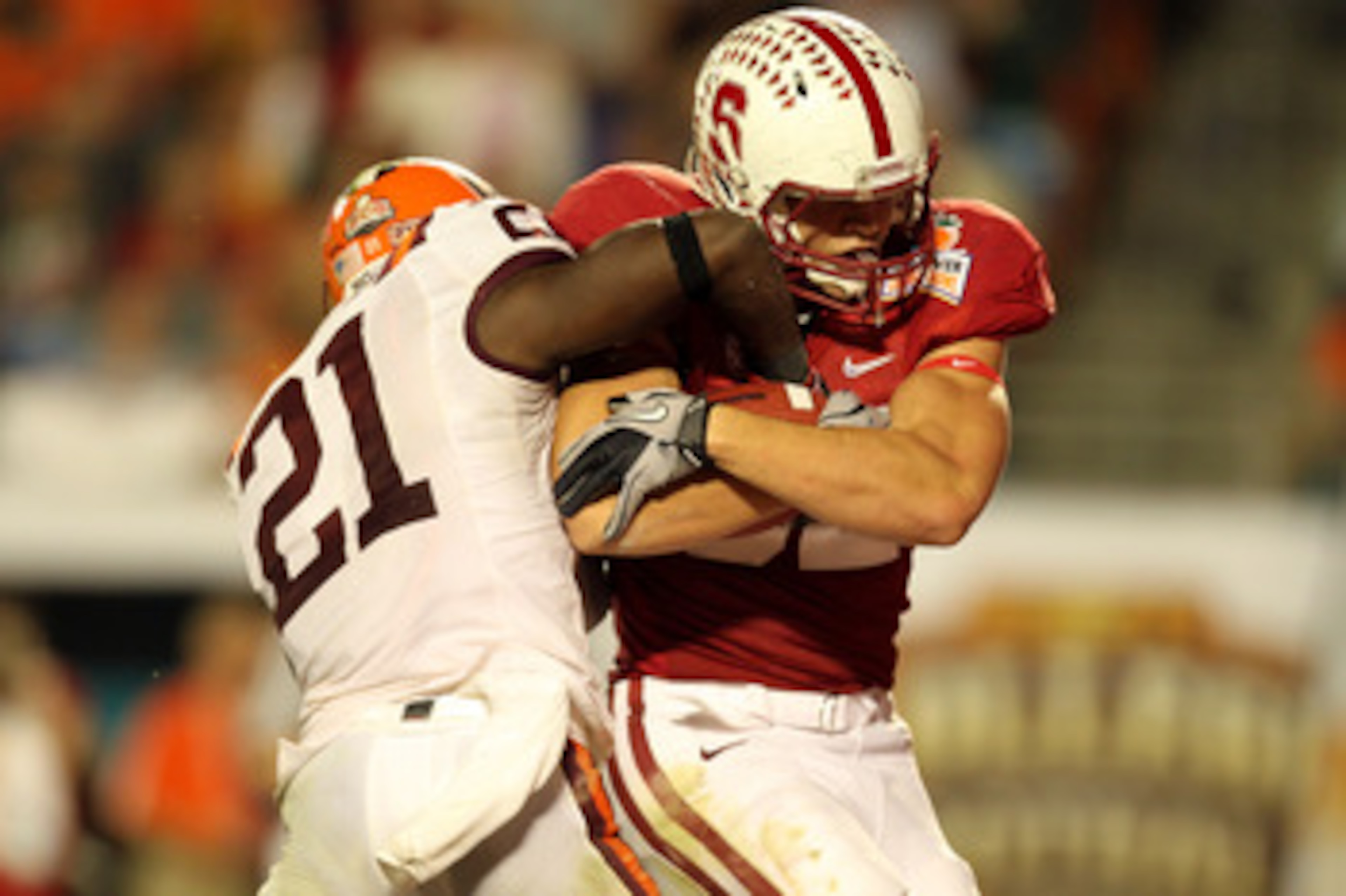 MIAMI, FL - JANUARY 03: Coby Fleener #82 of the Stanford Cardinal scores a 41-yard tochdown reception in the third quarter against Rashad Carmichael #21 of the Virginia Tech Hokies during the 2011 Discover Orange Bowl at Sun Life Stadium on January 3, 201 MIAMI, FL - JANUARY 03: Coby Fleener #82 of the Stanford Cardinal scores a 41-yard tochdown reception in the third quarter against Rashad Carmichael #21 of the Virginia Tech Hokies during the 2011 Discover Orange Bowl at Sun Life Stadium on January 3, 201
