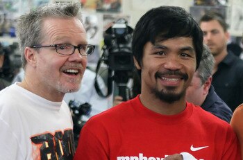 HOLLYWOOD, CA - APRIL 20:  Manny Pacquiao of the Philippines (C) poses with his coach Teddy Roach (L) and promoter Bob Arum (R) during a media workout at the Wild Card Boxing Club on April 20, 2011 in Hollywood, California.  (Photo by Jeff Gross/Getty Ima