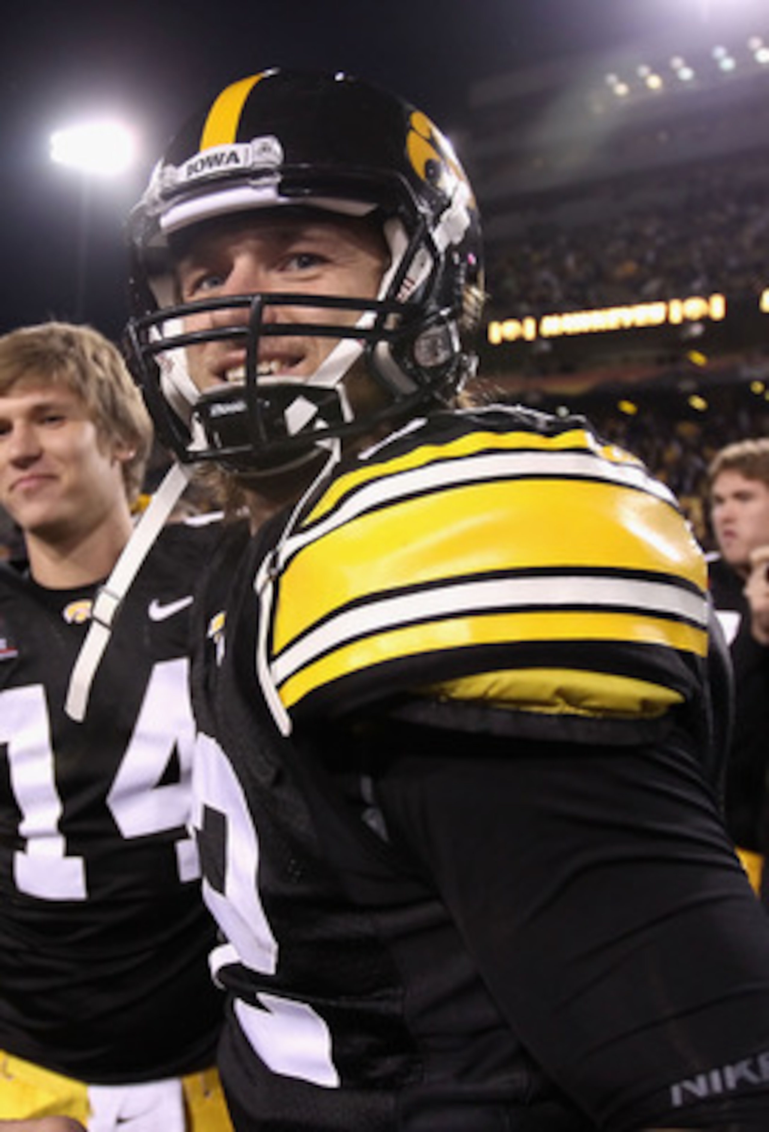 TEMPE, AZ - DECEMBER 28:  Quarterback Ricky Stanzi #12 of the Iowa Hawkeyes walks off the field after defeating the Missouri Tigers in the Insight Bowl at Sun Devil Stadium on December 28, 2010 in Tempe, Arizona. The Hawkeyes defeated the Tigers 27-24.  (