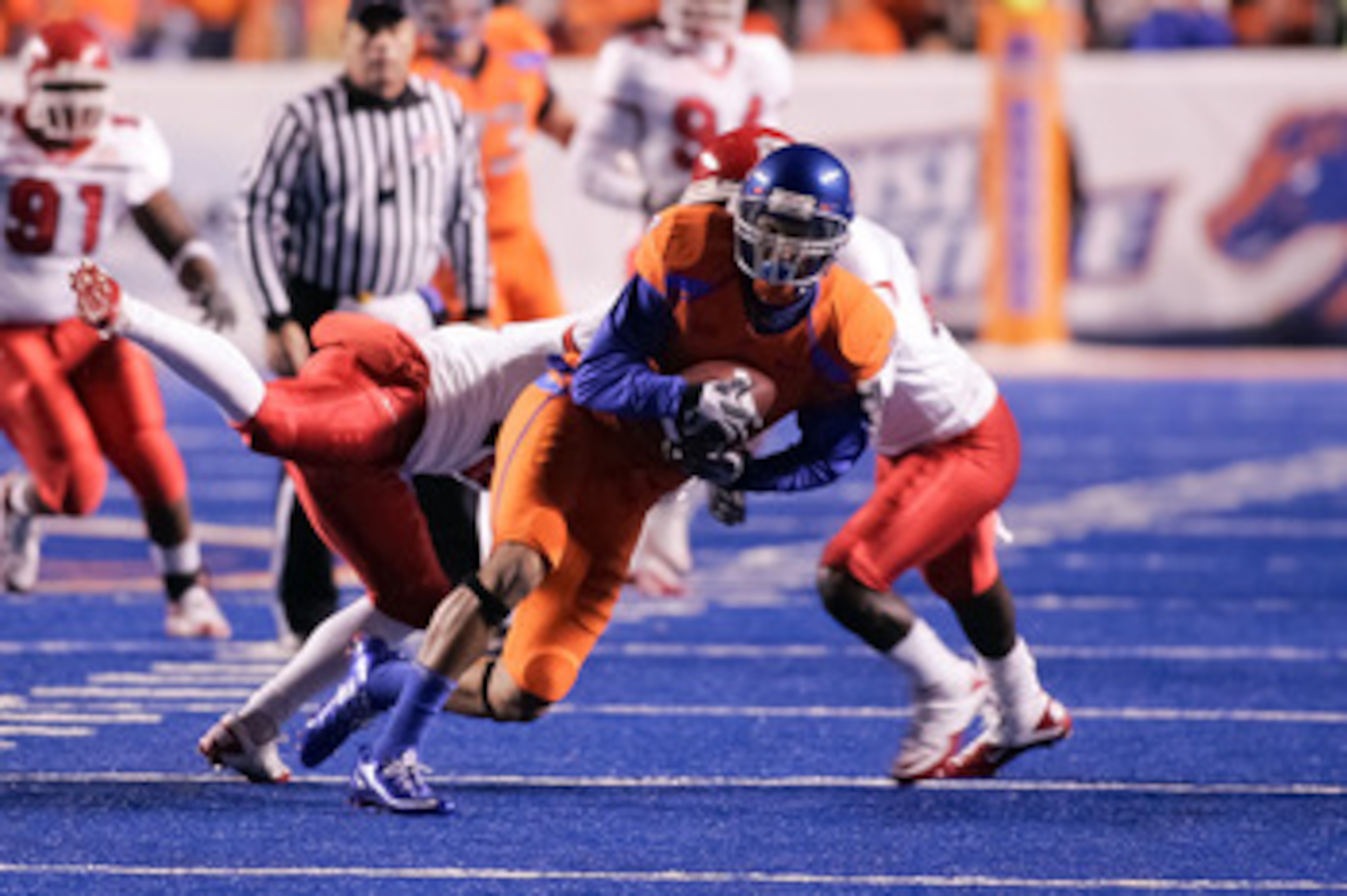 BOISE, ID - NOVEMBER 19:  Austin Pettis #2 of the Boise State Broncos runs after a catch against the Fresno State Bulldogs at Bronco Stadium on November 19, 2010 in Boise, Idaho.  (Photo by Otto Kitsinger III/Getty Images)