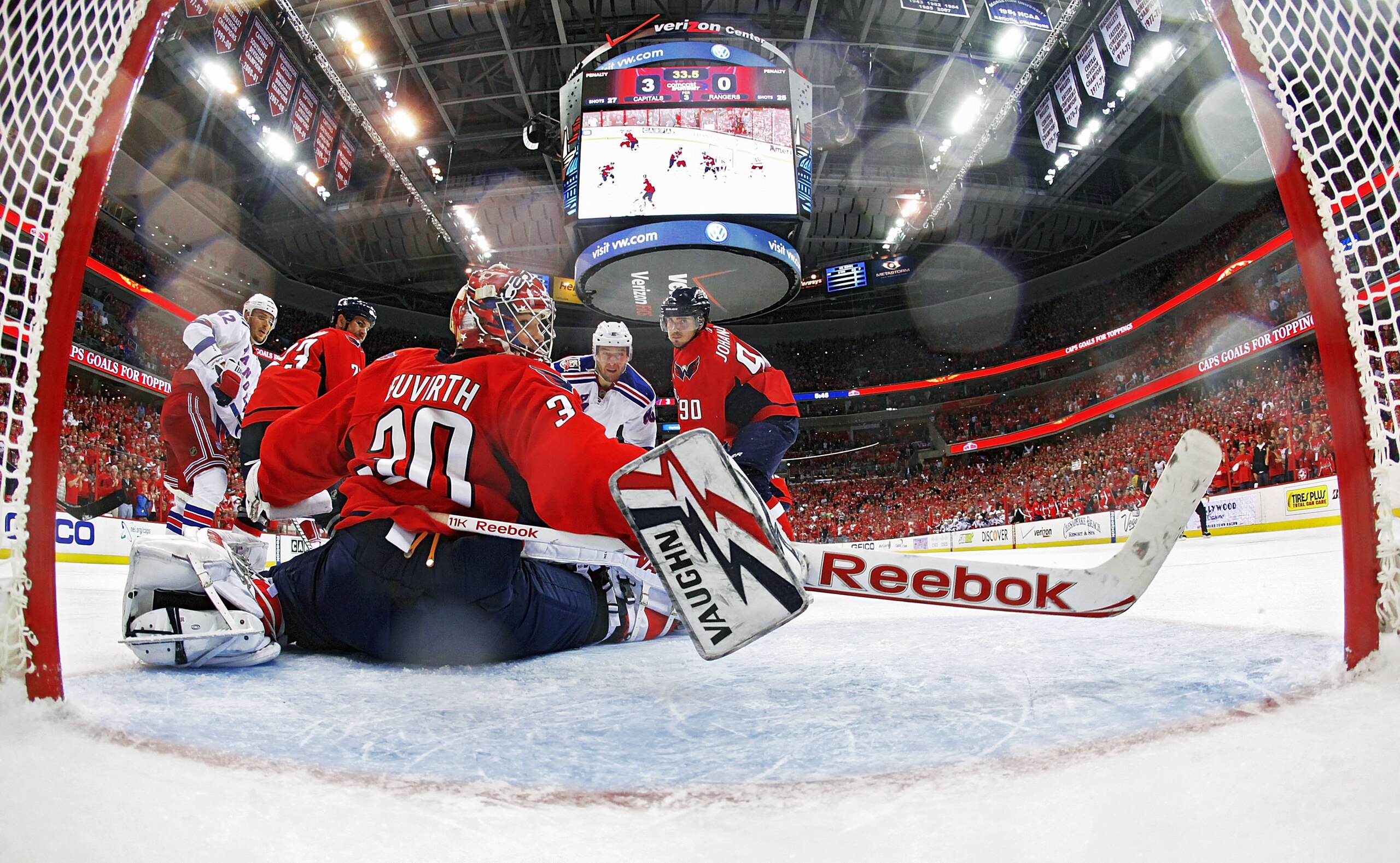 WASHINGTON, DC - APRIL 23:  Michal Neuvirth #30 of the Washington Capitals watches the only goal of the New York Rangers sail into the net in Game Five of the Eastern Conference Quarterfinals during the 2011 NHL Stanley Cup Playoffs at the Verizon Center 