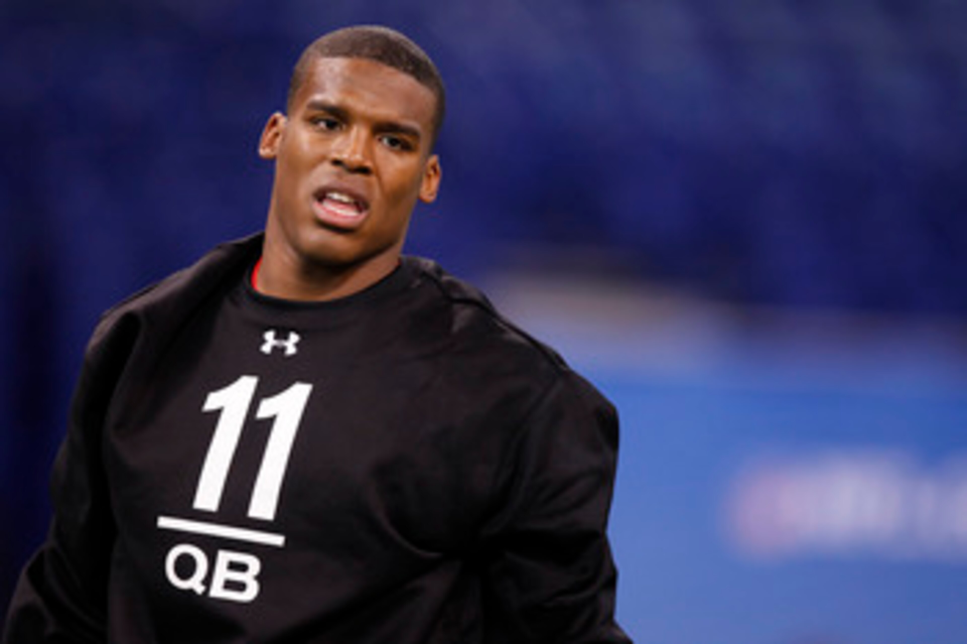INDIANAPOLIS, IN - FEBRUARY 27:  Cam Newton looks on during the 2011 NFL Scouting Combine at Lucas Oil Stadium on February 27, 2011 in Indianapolis, Indiana. (Photo by Joe Robbins/Getty Images)