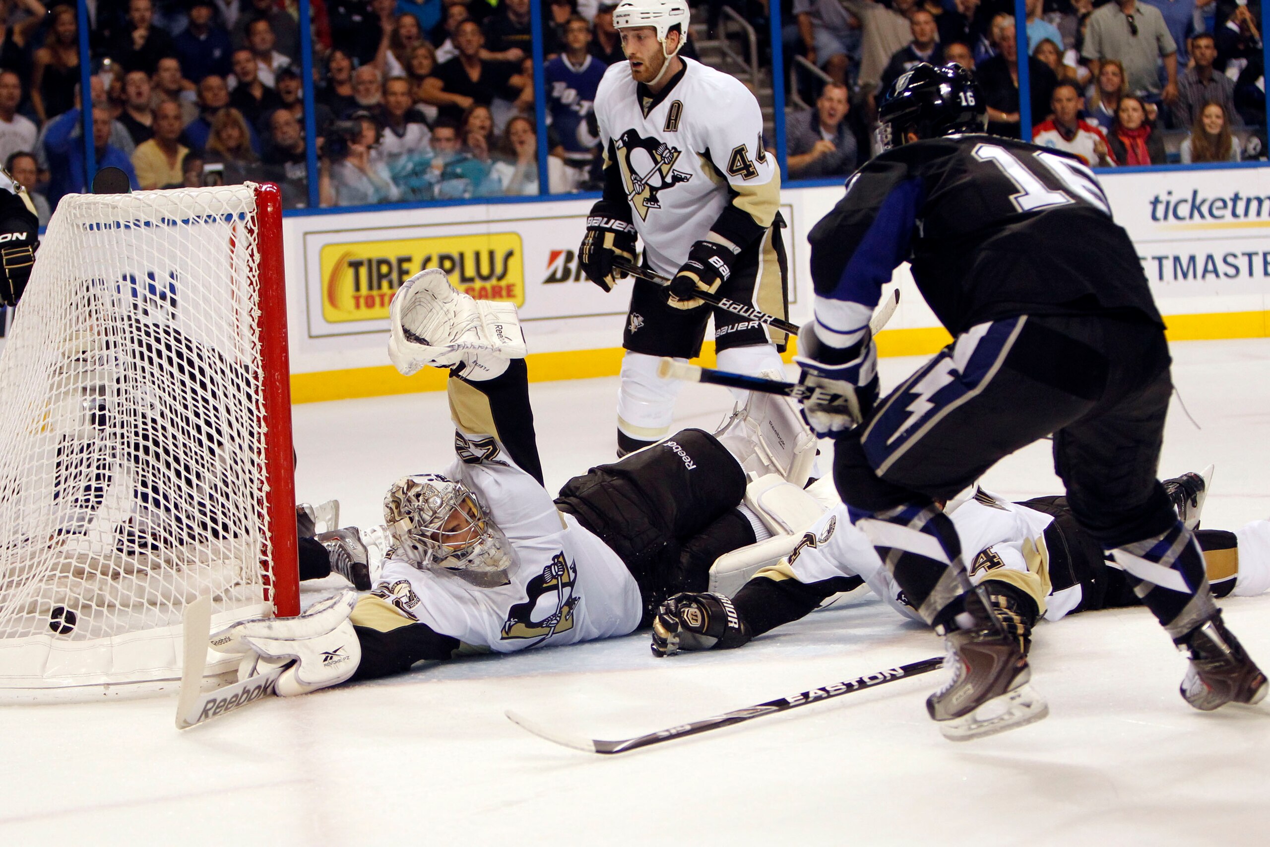 TAMPA, FL - APRIL 25: Teddy Purcell #16 of the Tampa Bay Lightning shoots and scores against Goaltender Mark-Andre Fleury #29 of the Pittsburgh Penguins in Game Six of the Eastern Conference Quarterfinals during the 2011 NHL Stanley Cup Playoffs at the St