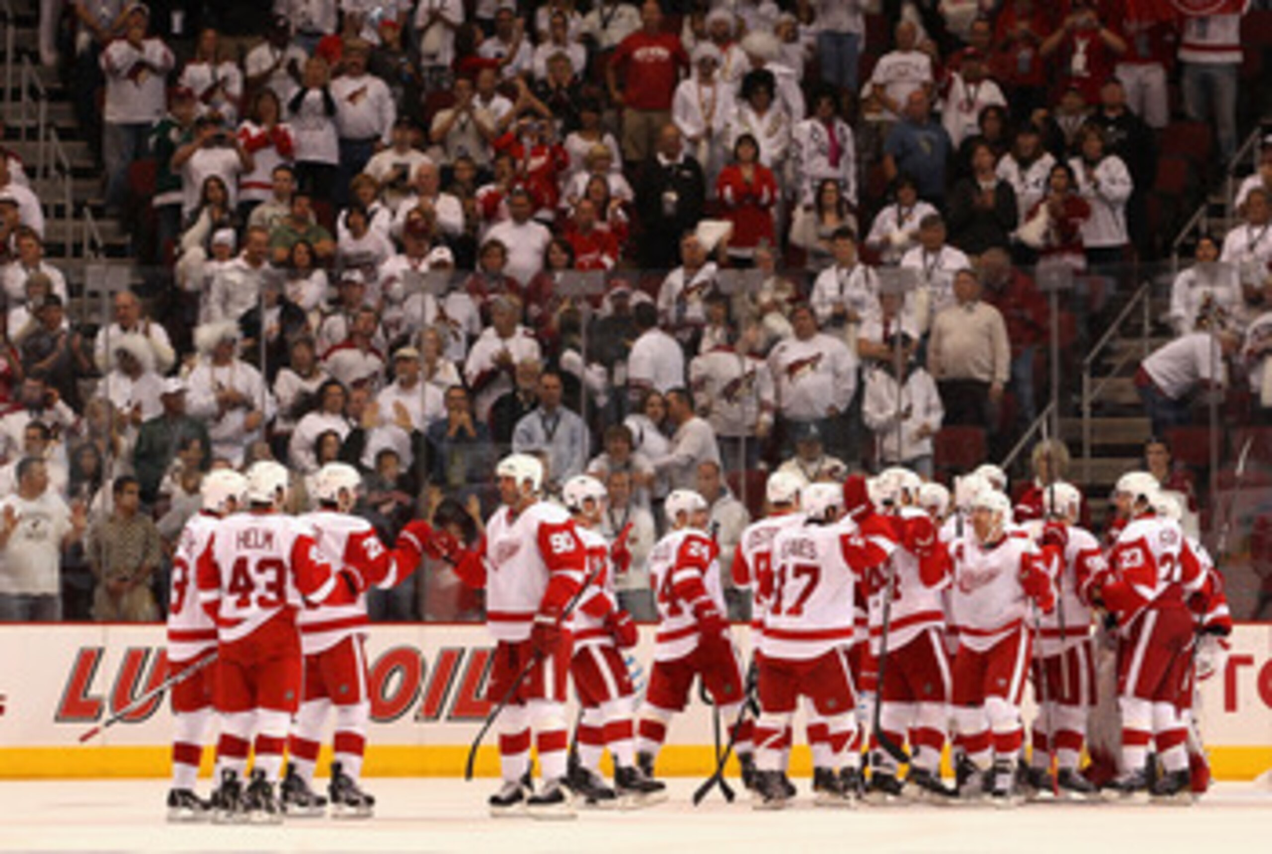 GLENDALE, AZ - APRIL 20: Mike Modano #90 of the Detroit Red Wings celebrates with teammates after defeating the Phoenix Coyotes in Game Four of the Western Conference Quarterfinals during the 2011 NHL Stanley Cup Playoffs at Jobing.com Arena on April 20, GLENDALE, AZ - APRIL 20: Mike Modano #90 of the Detroit Red Wings celebrates with teammates after defeating the Phoenix Coyotes in Game Four of the Western Conference Quarterfinals during the 2011 NHL Stanley Cup Playoffs at Jobing.com Arena on April 20,