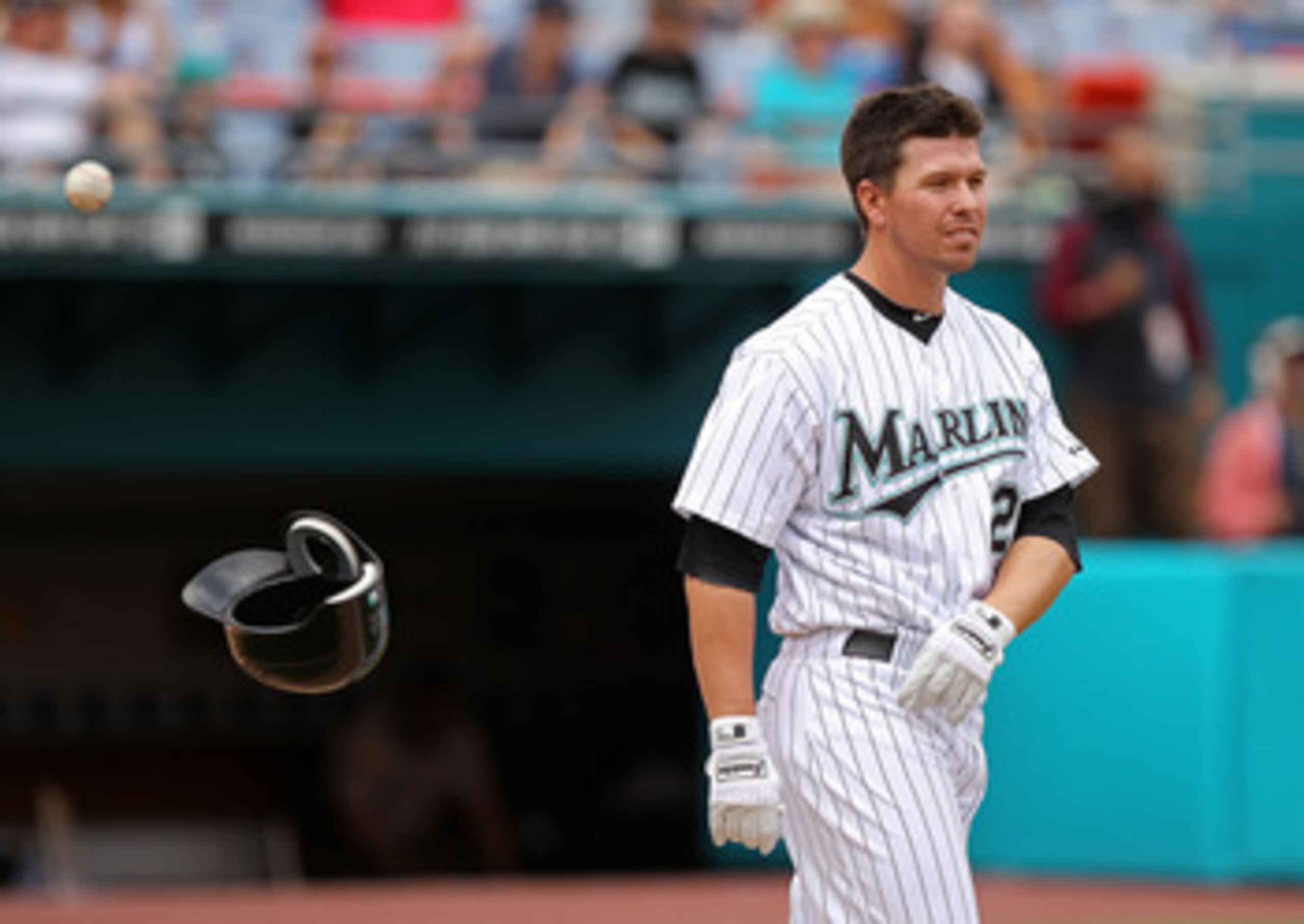 MIAMI GARDENS, FL - APRIL 24: Donnie Murphy #22 of the Florida Marlins walks to the field after striking out during a game against the Colorado Rockies at Sun Life Stadium on April 24, 2011 in Miami Gardens, Florida. (Photo by Mike Ehrmann/Getty Images) MIAMI GARDENS, FL - APRIL 24: Donnie Murphy #22 of the Florida Marlins walks to the field after striking out during a game against the Colorado Rockies at Sun Life Stadium on April 24, 2011 in Miami Gardens, Florida. (Photo by Mike Ehrmann/Getty Images)