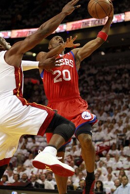 MIAMI, FL - APRIL 16: Guard Jodie Meeks #20 of the Philadelphia 76ers drives against Dwyane Wade #3 of the Miami Heat at the American Airlines Arena in Game One of the Eastern Conference Quarterfinals in the 2011 NBA Playoffs on April 16, 2011 in Miami, F