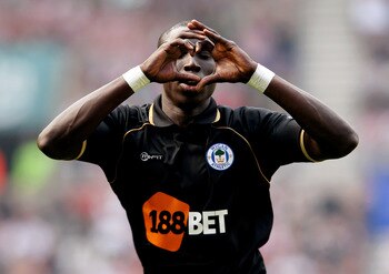 SUNDERLAND, ENGLAND - APRIL 23: Mohamed Diame of Wigan celebrates after scoring their first goal during the Barclays Premier League match between Sunderland and Wigan Athletic at Stadium of Light on April 23, 2011 in Sunderland, England.  (Photo by Scott 