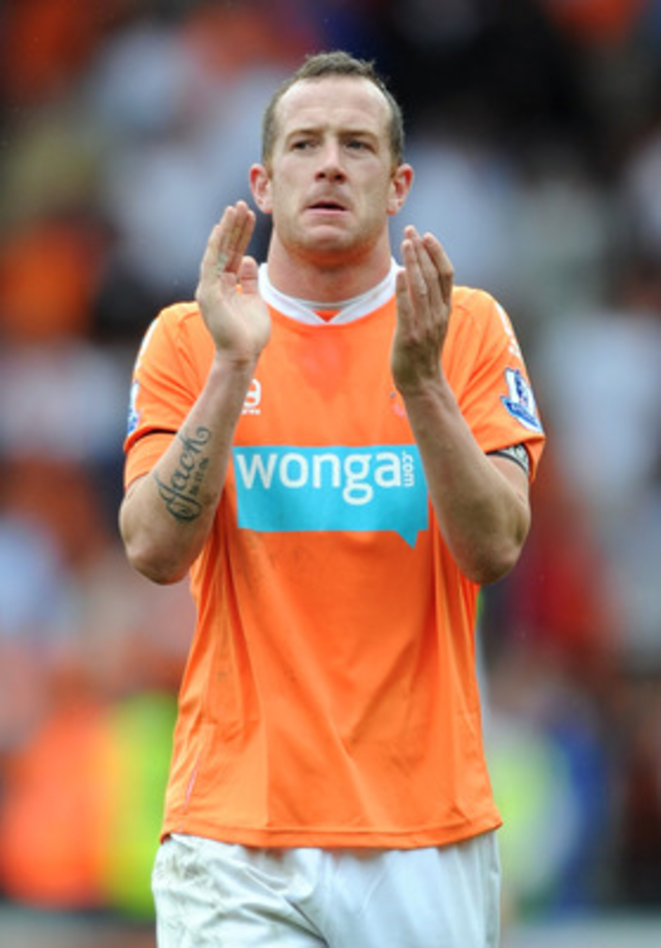 BLACKPOOL, ENGLAND - APRIL 23:  Charlie Adam of Blackpool applauds the supporters at full-time following the Barclays Premier League match between Blackpool and Newcastle United at Bloomfield Road on April 23, 2011 in Blackpool, England.  (Photo by Chris 