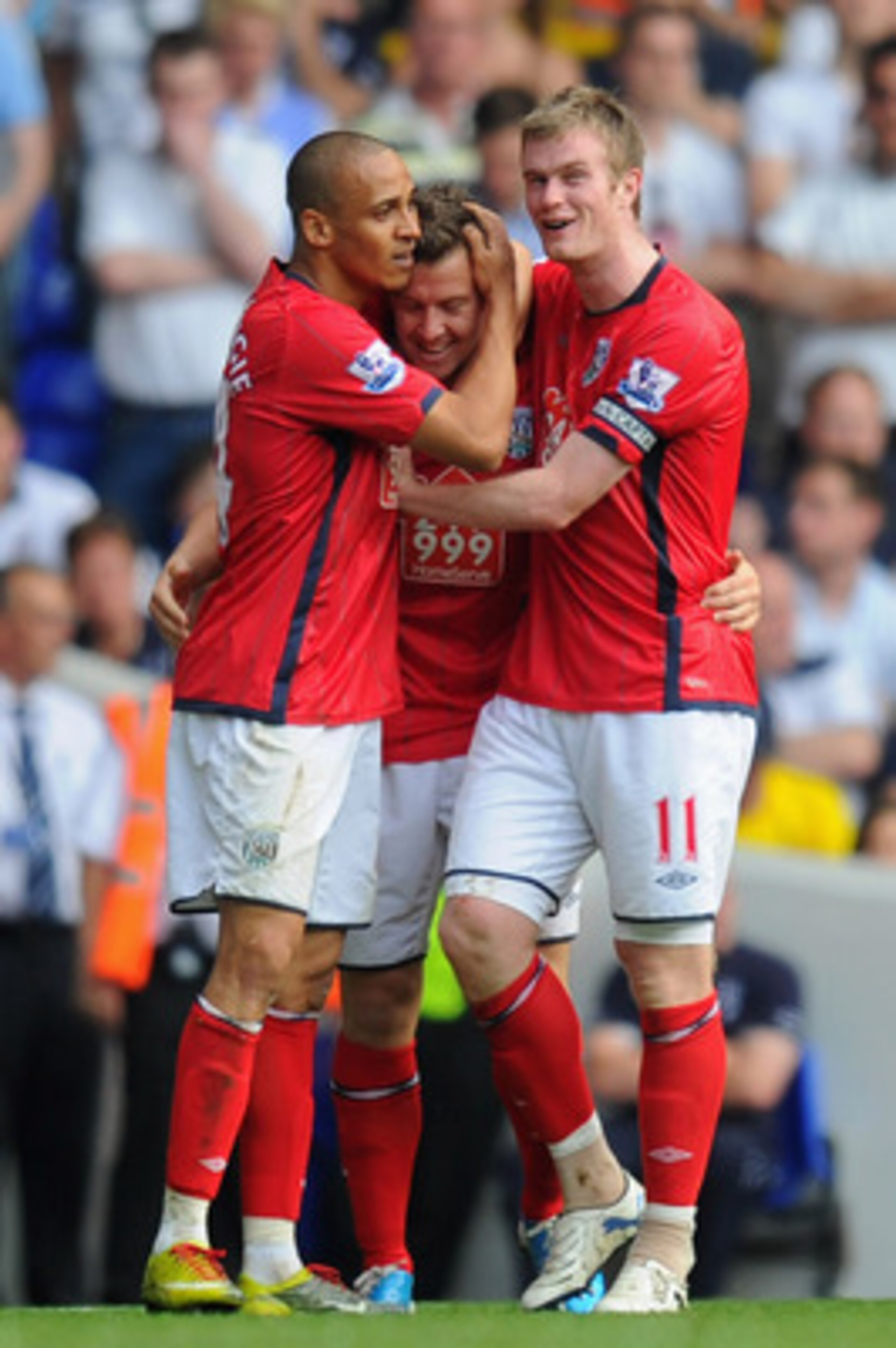 LONDON, ENGLAND - APRIL 23:  Peter Odemwingie  and Chris Brunt congratulate Simon Cox of West Brom on scoring their second goal during the Barclays Premier League match between Tottenham Hotspur and West Bromwich Albion at White Hart Lane on April 23, 201