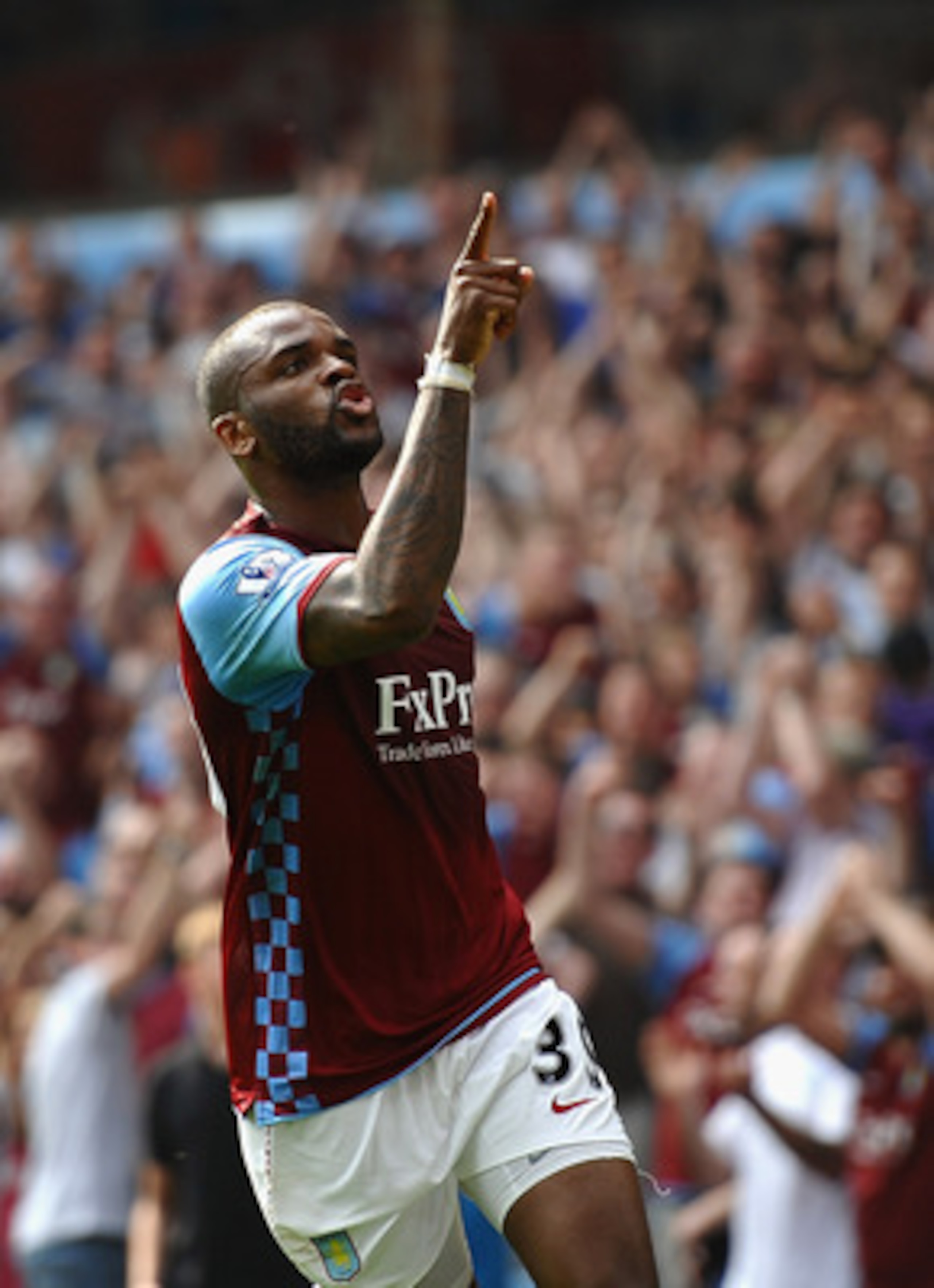 BIRMINGHAM, ENGLAND - APRIL 23:  Darren Bent of Aston Villa celebrates scoring the equaliser during the Barclays Premier League match between Aston Villa and Stoke City at Villa Park on April 23, 2011 in Birmingham, England.  (Photo by Laurence Griffiths/