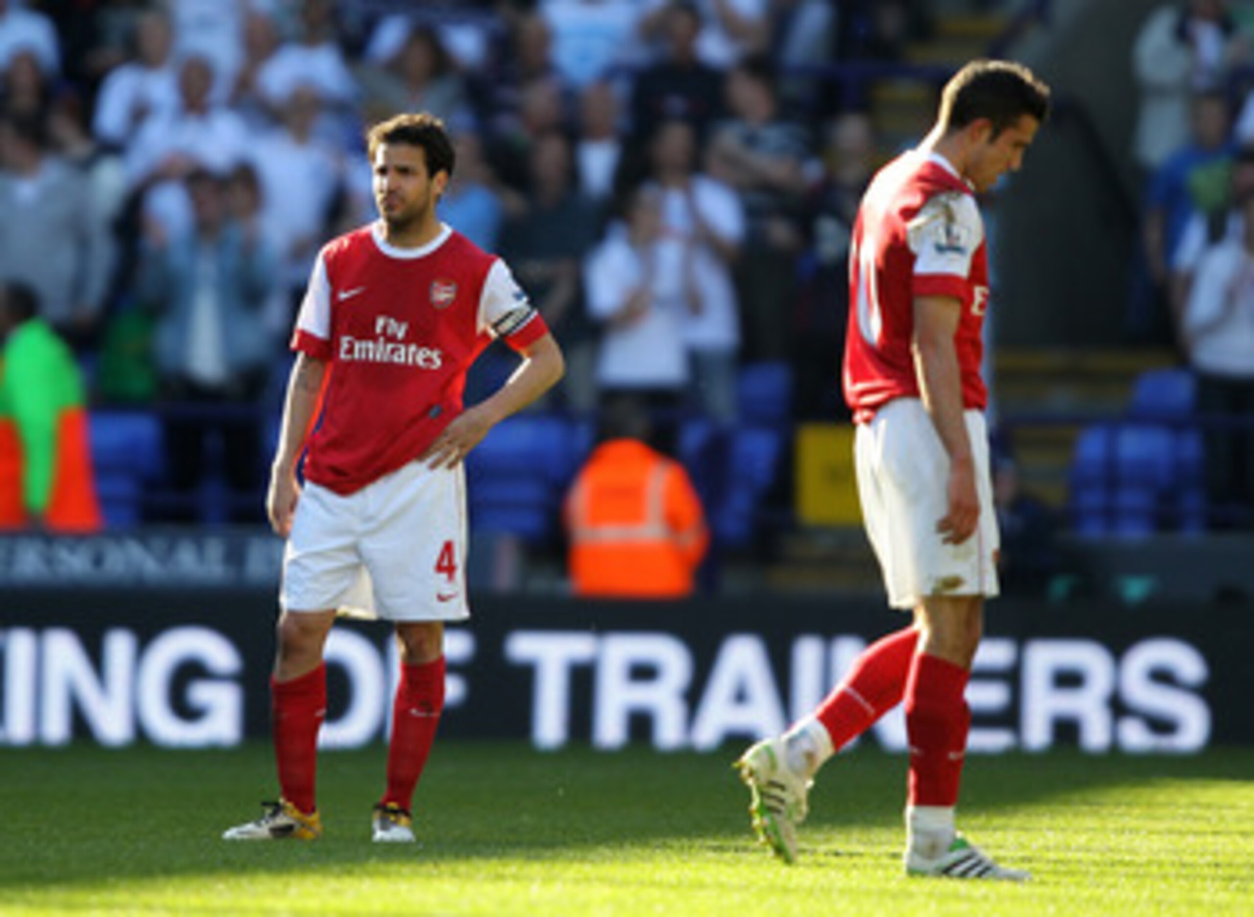 BOLTON, ENGLAND - APRIL 24:  Cesc Fabregas of Arsenal looks dejected at the end of the Barclays Premier League match between Bolton Wanderers and Arsenal at the Reebok Stadium on April 24, 2011 in Bolton, England.  (Photo by Clive Brunskill/Getty Images)