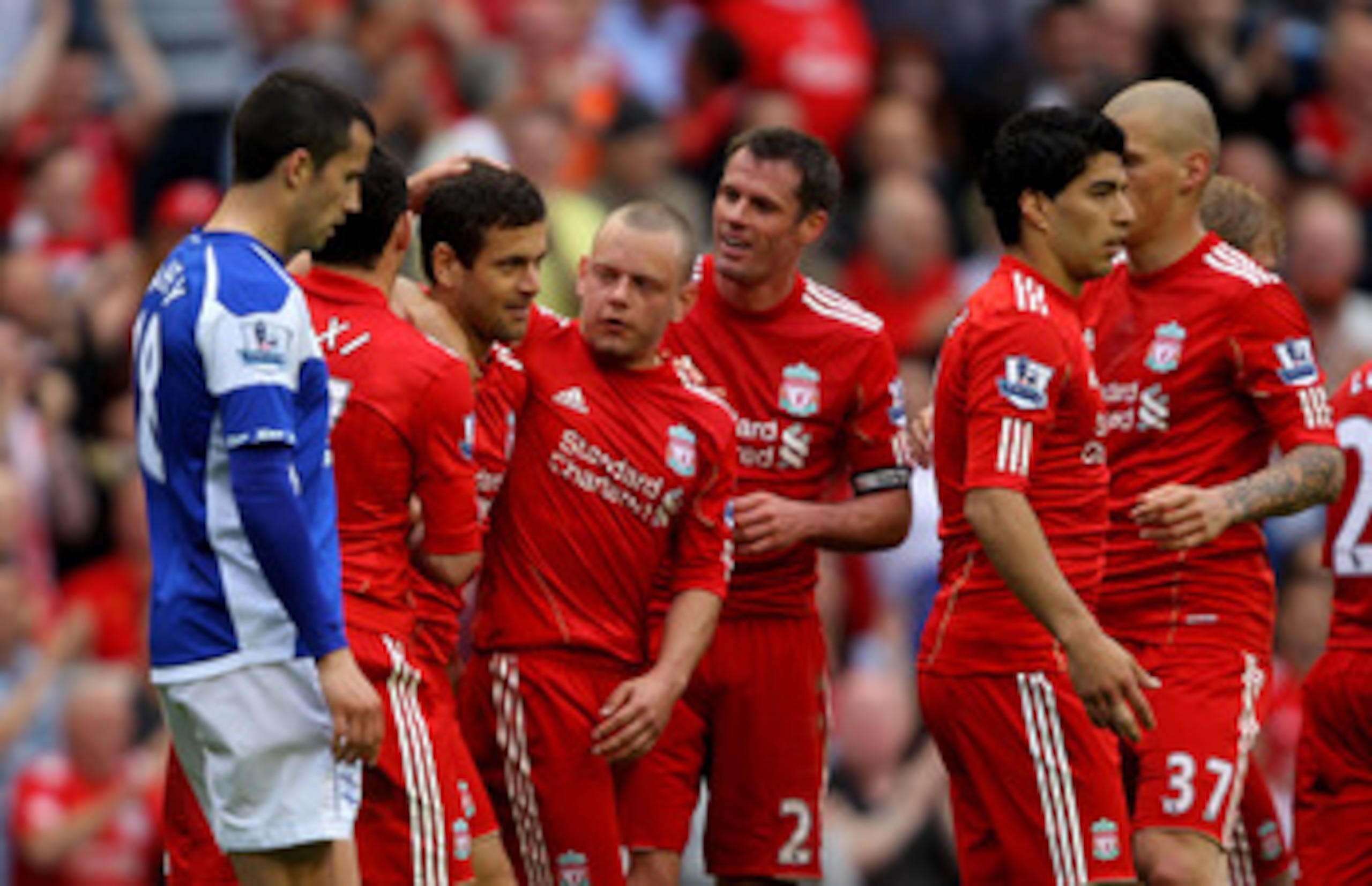 LIVERPOOL, ENGLAND - APRIL 23:  Joe Cole of Liverpool celebrates scoring his team's fifth goal with his team mates during the Barclays Premier League match between Liverpool and Birmingham City at Anfield on April 23, 2011 in Liverpool, England.  (Photo b