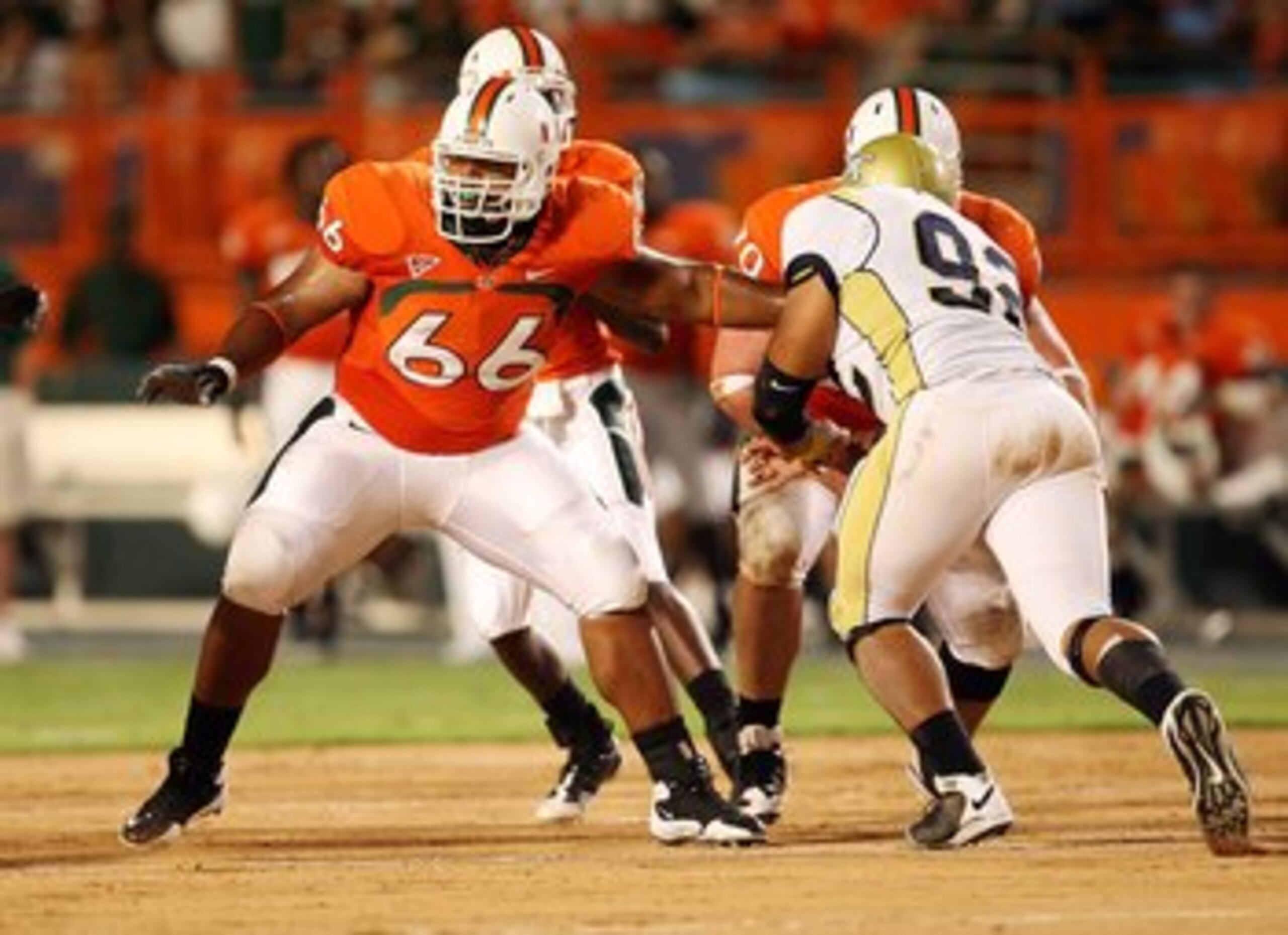 MIAMI GARDENS, FL - SEPTEMBER 17:  Offensive lineman Harland Gunn #66 of the Miami Hurricanes drops back to pass block while taking on the Georgia Tech Yellow Jackets at Land Shark Stadium on September 17, 2009 in Miami Gardens, Florida. Miami defeated Ge