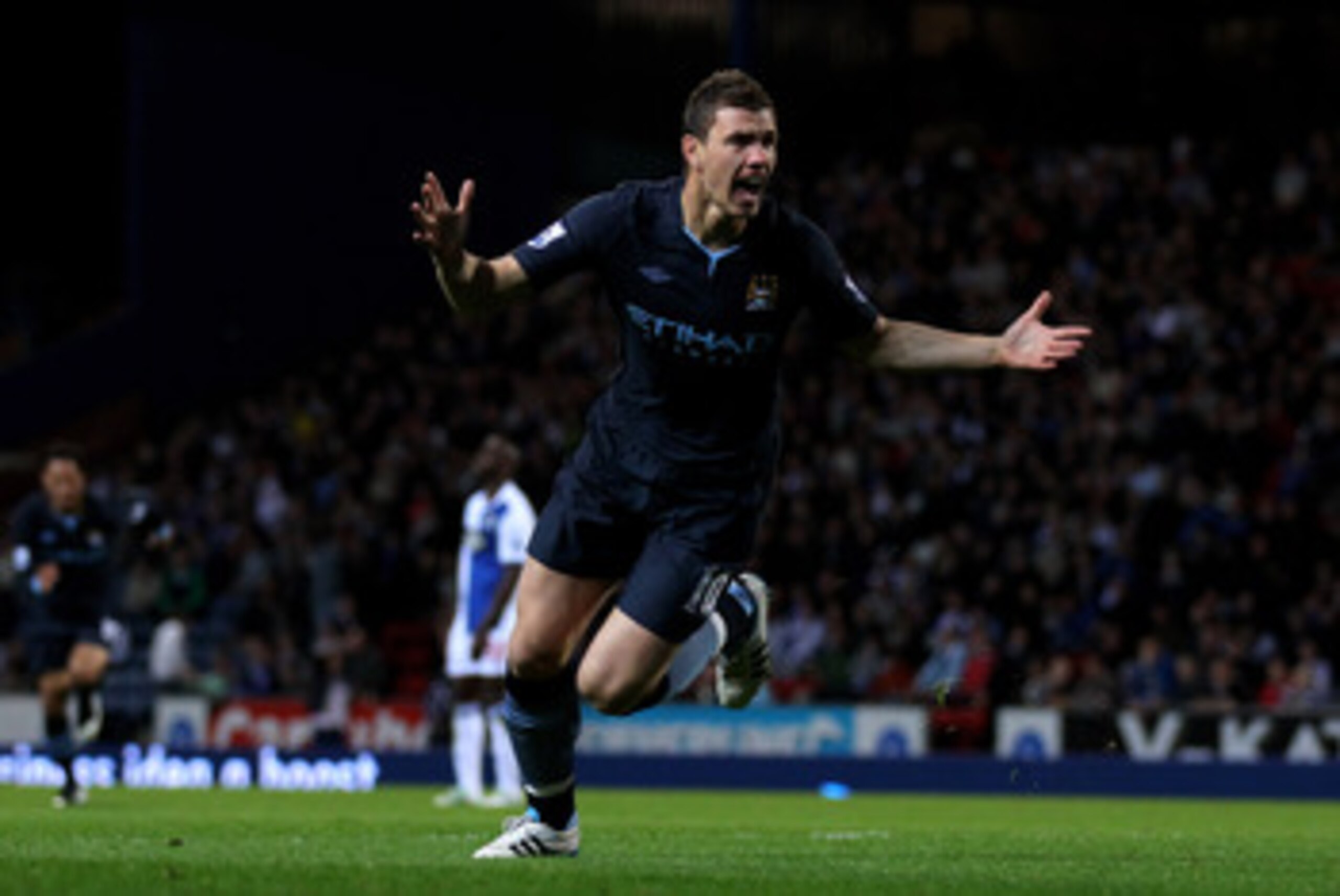 BLACKBURN, ENGLAND - APRIL 25:  Edin Dzeko of Manchester City celebrates scoring the opening goal during the Barclays Premier League match between Blackburn Rovers and Manchester City at Ewood Park on April 25, 2011 in Blackburn, England.  (Photo by Alex 