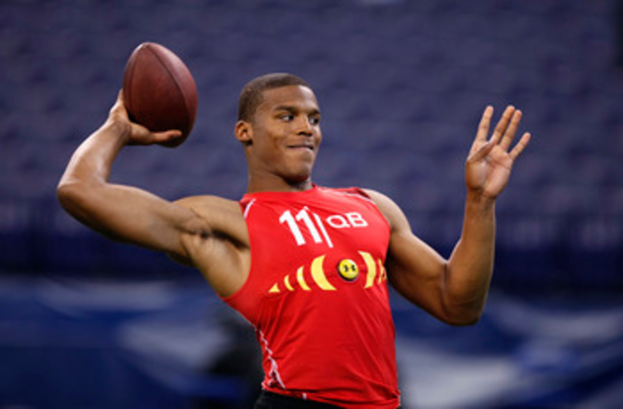 INDIANAPOLIS, IN - FEBRUARY 27: Cam Newton passes the ball during the 2011 NFL Scouting Combine at Lucas Oil Stadium on February 27, 2011 in Indianapolis, Indiana. (Photo by Joe Robbins/Getty Images)