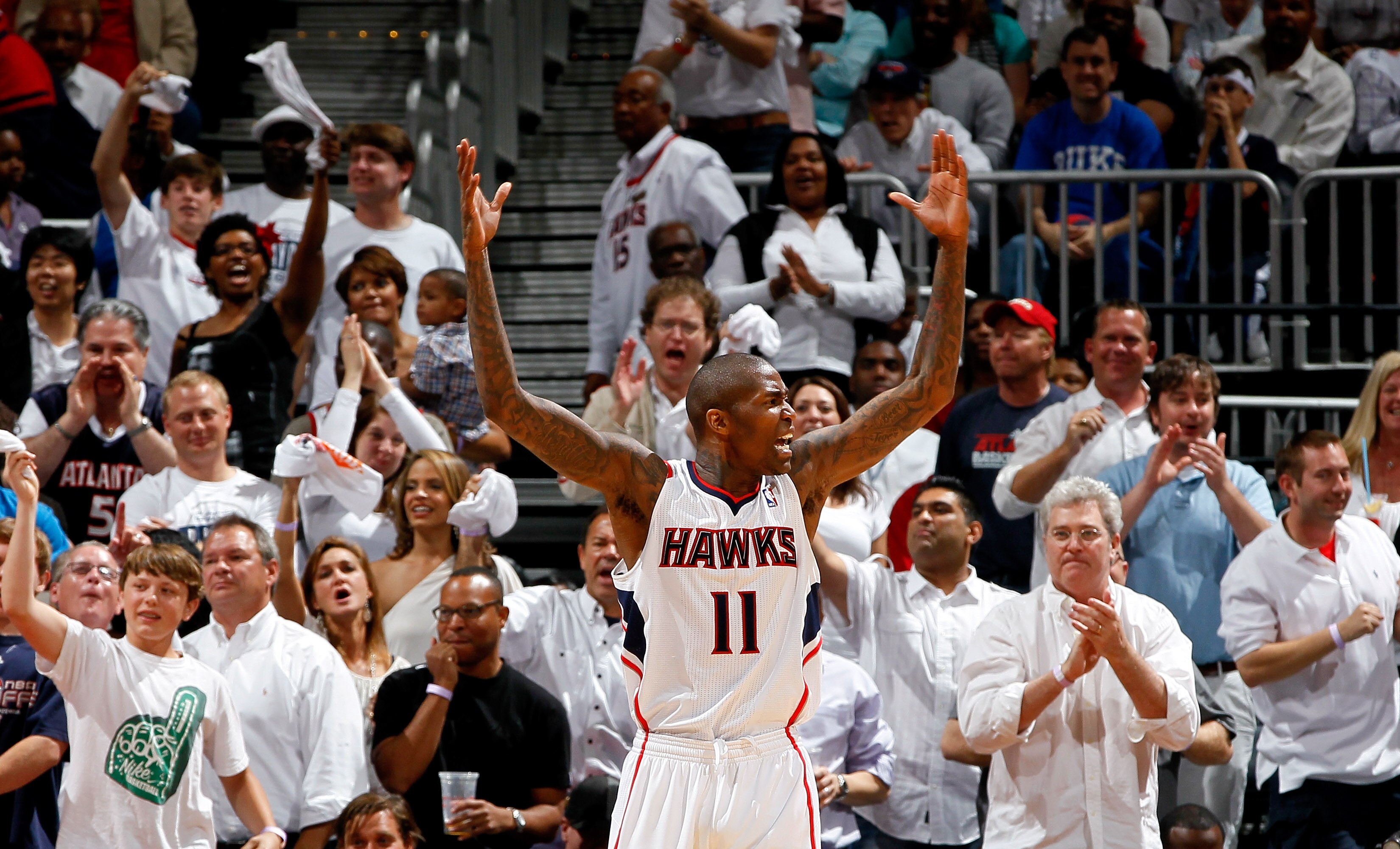 ATLANTA, GA - APRIL 28:  Jamal Crawford #11 of the Atlanta Hawks reacts to the fans after a basket against the Orlando Magic during Game Six of the Eastern Conference Quarterfinals in the 2011 NBA Playoffs at Philips Arena on April 28, 2011 in Atlanta, Ge