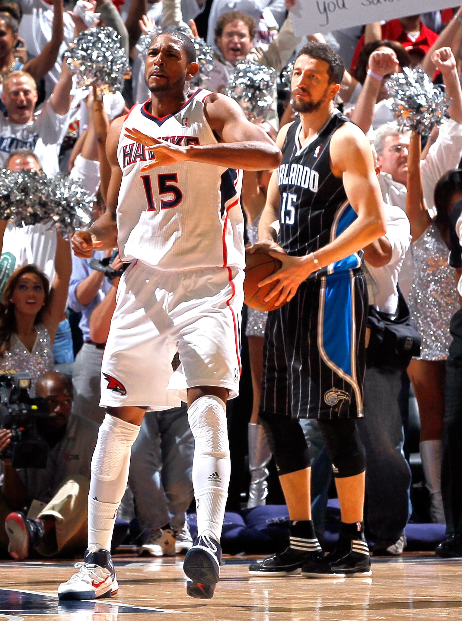 ATLANTA, GA - APRIL 28:  Al Horford #15 of the Atlanta Hawks reacts after their 84-81 win over Hedo Turkoglu #15 and the Orlando Magic during Game Six of the Eastern Conference Quarterfinals in the 2011 NBA Playoffs at Philips Arena on April 28, 2011 in A