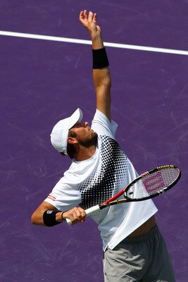 KEY BISCAYNE, FL - APRIL 01:  Mardy Fish serves against Novak Djokovic of Serbia during their semifinal match at the Sony Ericsson Open at Crandon Park Tennis Center on April 1, 2011 in Key Biscayne, Florida.  (Photo by Clive Brunskill/Getty Images)