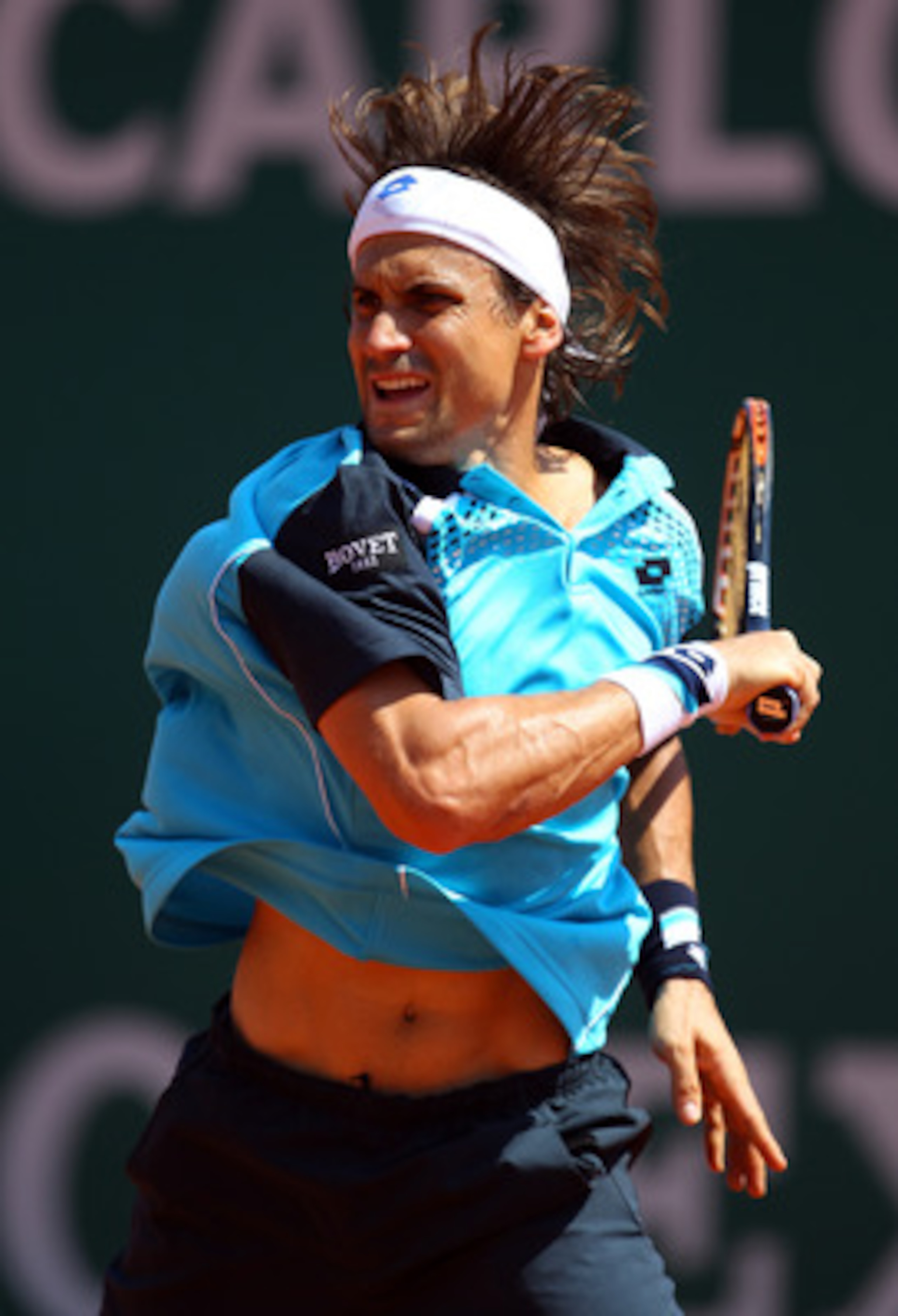 MONACO - APRIL 16:  David Ferrer of Spain plays a forehand in his match against Jurgen Melzer of Austria during Day Seven of the ATP Masters Series Tennis at the Monte Carlo Country Club on April 16, 2011 in Monte Carlo, Monaco.  (Photo by Julian Finney/G