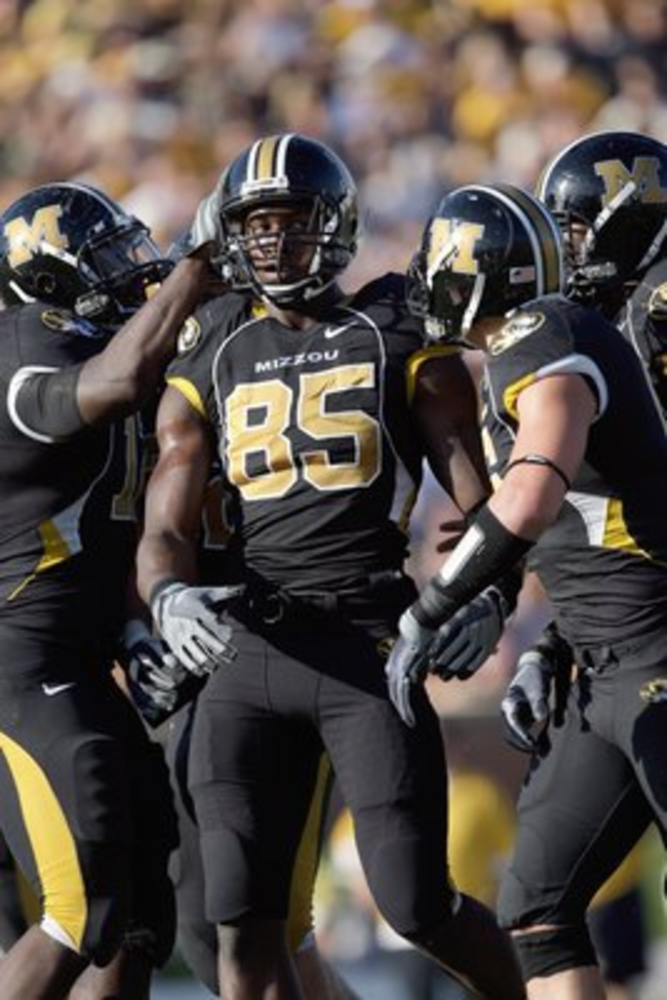 COLUMBIA, MO - NOVEMBER 7: Aldon Smith #85 of the Missouri Tigers is congratulated by teammates during the game against the Baylor Bears at Faurot Field/Memorial Stadium on November 7, 2009 in Columbia, Missouri. (Photo by Jamie Squire/Getty Images) COLUMBIA, MO - NOVEMBER 7: Aldon Smith #85 of the Missouri Tigers is congratulated by teammates during the game against the Baylor Bears at Faurot Field/Memorial Stadium on November 7, 2009 in Columbia, Missouri. (Photo by Jamie Squire/Getty Images)