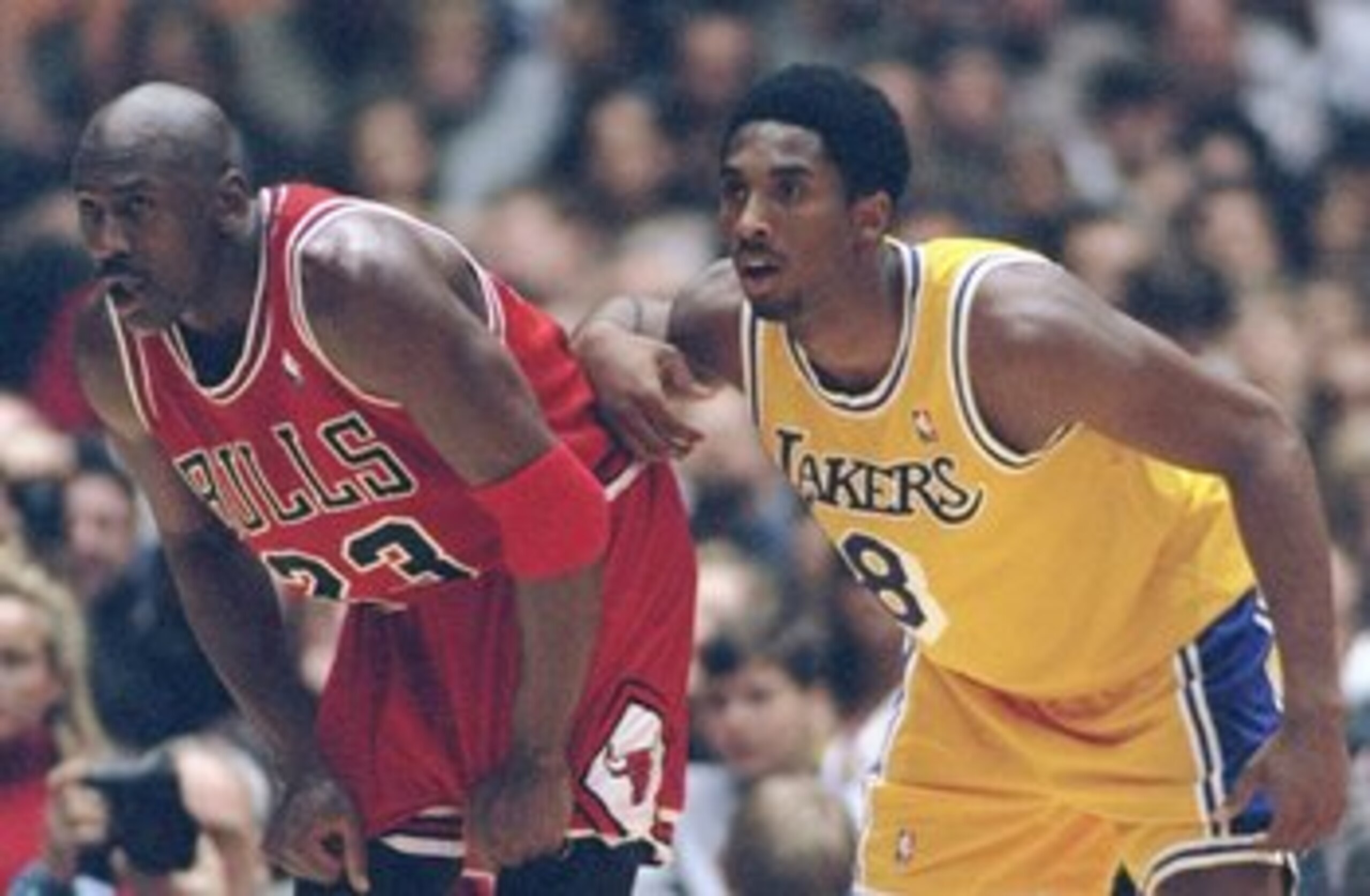 1 Feb 1998: Guard Michael Jordan of the Chicago Bulls (left) and guard Kobe Bryant of the Los Angeles Lakers look on during a game at the Great Western Forum in Inglewood, California. The Lakers won the game, 112-87. Mandatory Credit: Jed Jacobsohn /Al 1 Feb 1998: Guard Michael Jordan of the Chicago Bulls (left) and guard Kobe Bryant of the Los Angeles Lakers look on during a game at the Great Western Forum in Inglewood, California. The Lakers won the game, 112-87. Mandatory Credit: Jed Jacobsohn /Al