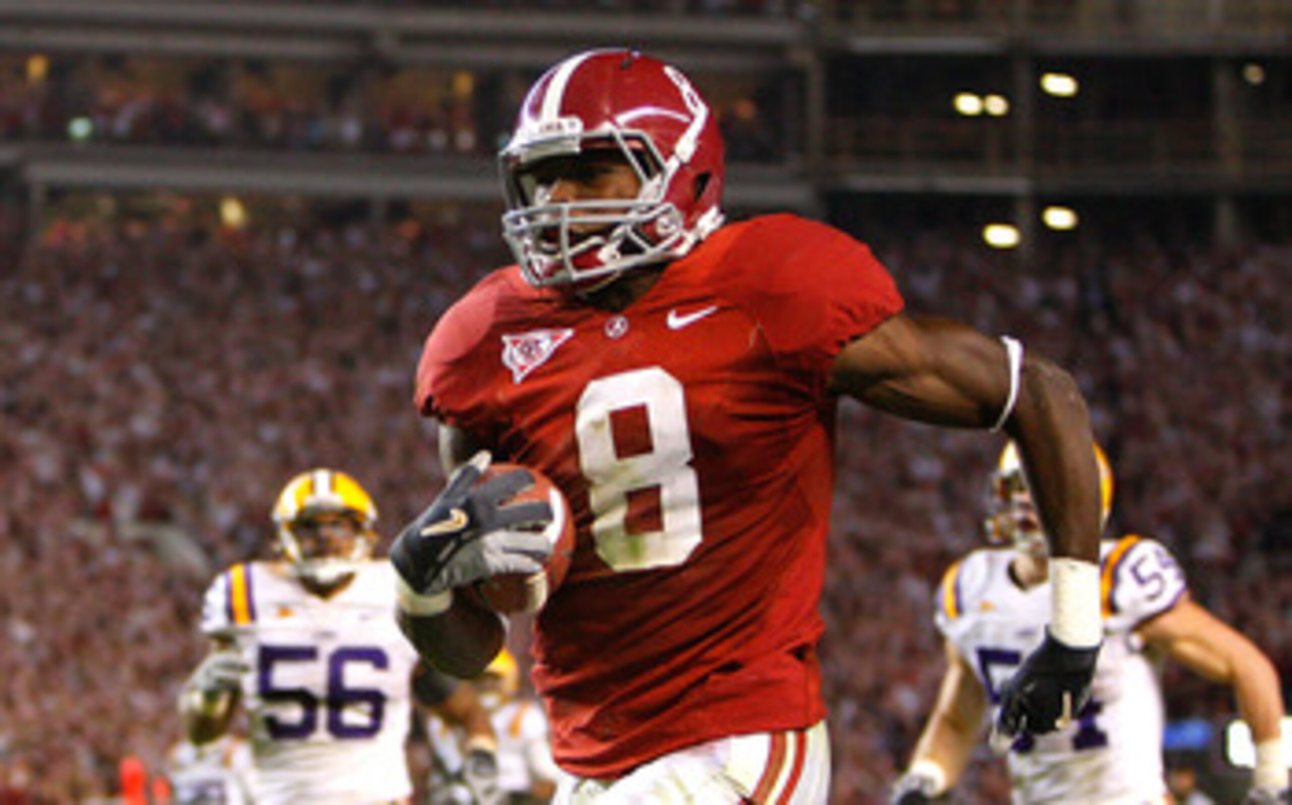 TUSCALOOSA, AL - NOVEMBER 07: Julio Jones #8 of the Alabama Crimson Tide rushes upfield for a 73 yard touchdown against the Louisiana State University Tigers at Bryant-Denny Stadium on November 7, 2009 in Tuscaloosa, Alabama. (Photo by Kevin C. Cox/Gett TUSCALOOSA, AL - NOVEMBER 07: Julio Jones #8 of the Alabama Crimson Tide rushes upfield for a 73 yard touchdown against the Louisiana State University Tigers at Bryant-Denny Stadium on November 7, 2009 in Tuscaloosa, Alabama. (Photo by Kevin C. Cox/Gett