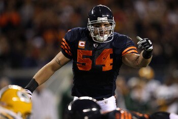 CHICAGO - SEPTEMBER 27:  Brian Urlacher #54 of the Chicago Bears gestures at the line of scrimmage against the Green Bay Packers at Soldier Field on September 27, 2010 in Chicago, Illinois.  (Photo by Jonathan Daniel/Getty Images)