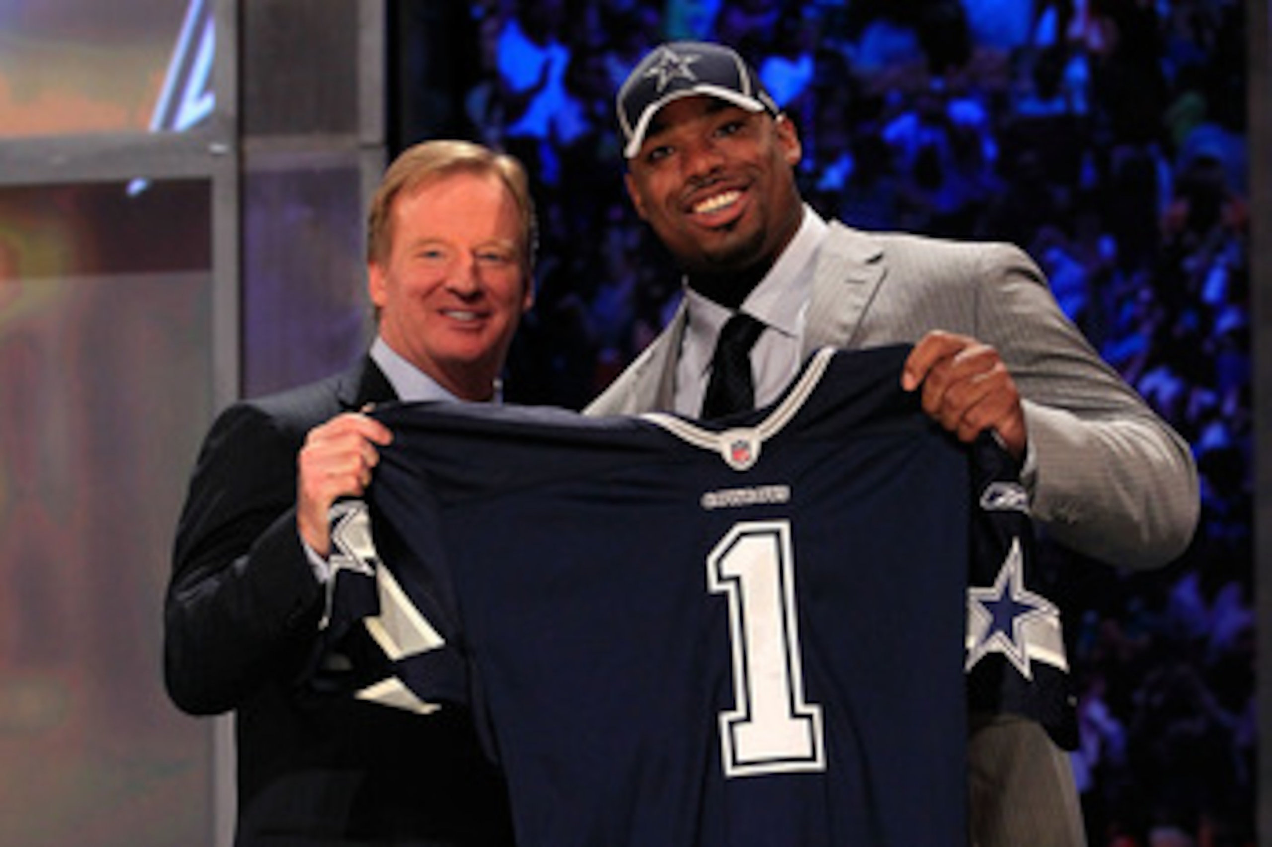 NEW YORK, NY - APRIL 28: NFL Commissioner Roger Goodell (L) poses for a photo with Tyron Smith, #9 overall pick by the Dallas Cowboys, on stage during the 2011 NFL Draft at Radio City Music Hall on April 28, 2011 in New York City. (Photo by Chris Trotma NEW YORK, NY - APRIL 28: NFL Commissioner Roger Goodell (L) poses for a photo with Tyron Smith, #9 overall pick by the Dallas Cowboys, on stage during the 2011 NFL Draft at Radio City Music Hall on April 28, 2011 in New York City. (Photo by Chris Trotma