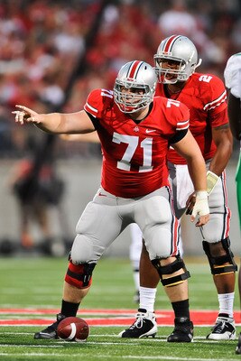 COLUMBUS, OH - SEPTEMBER 2: Corey Linsley #71 of the Ohio State Buckeyes gets ready to snap the ball against the Marshall Thundering Herd at Ohio Stadium on September 2, 2010 in Columbus, Ohio. (Photo by Jamie Sabau/Getty Images)