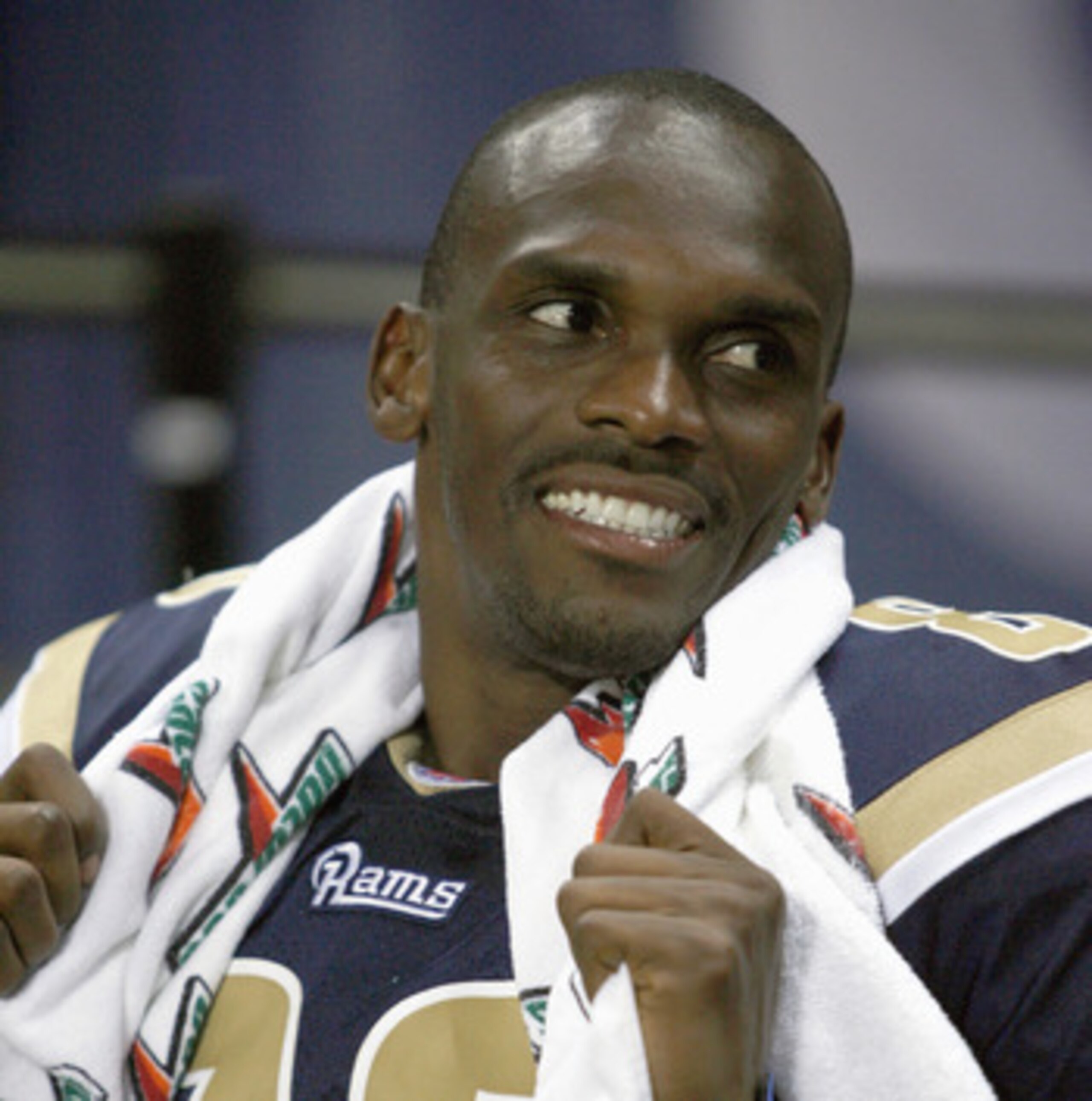 ST. LOUIS - AUGUST 10: Isaac Bruce #80 of the St. Louis Rams smiles on the bench during the preseason game against the Indianapolis Colts at the Edward Jones Dome on August 10, 2006 in St. Louis, Missouri. (Photo by: Dilip Vishwanat/Getty Images)