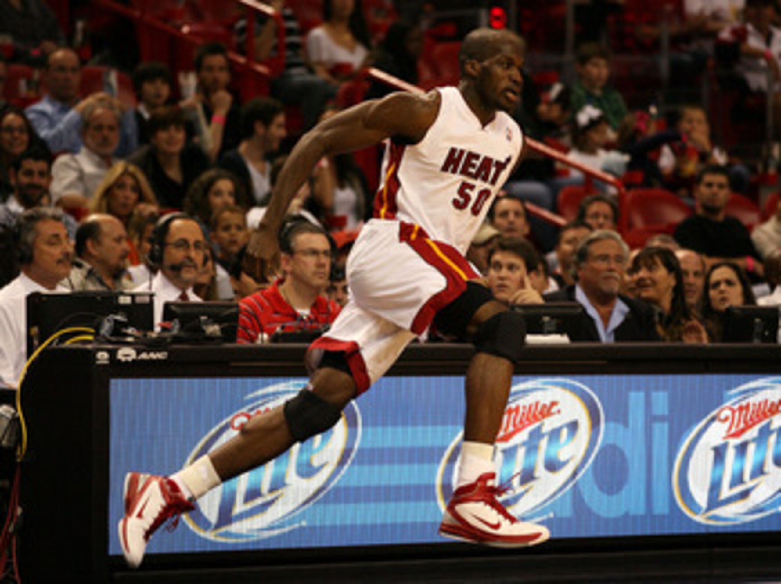 MIAMI - NOVEMBER 26:  Center Joel Anthony #50  of the Miami Heat jumps on the court against the Philadelphia 76ers at American Airlines Arena on November 26, 2010 in Miami, Florida. The Heat defeated the 76ers 99-90.  (Photo by Marc Serota/Getty Images)