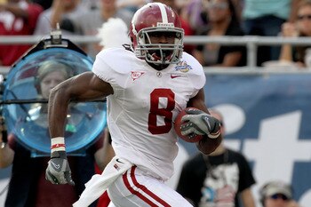 ORLANDO, FL - JANUARY 01:  Julio Jones #8 of the Alabama Crimson Tide rushes for a touchdown during the Capitol One Bowl against the Michigan State Spartans at the Florida Citrus Bowl on January 1, 2011 in Orlando, Florida.  (Photo by Mike Ehrmann/Getty I