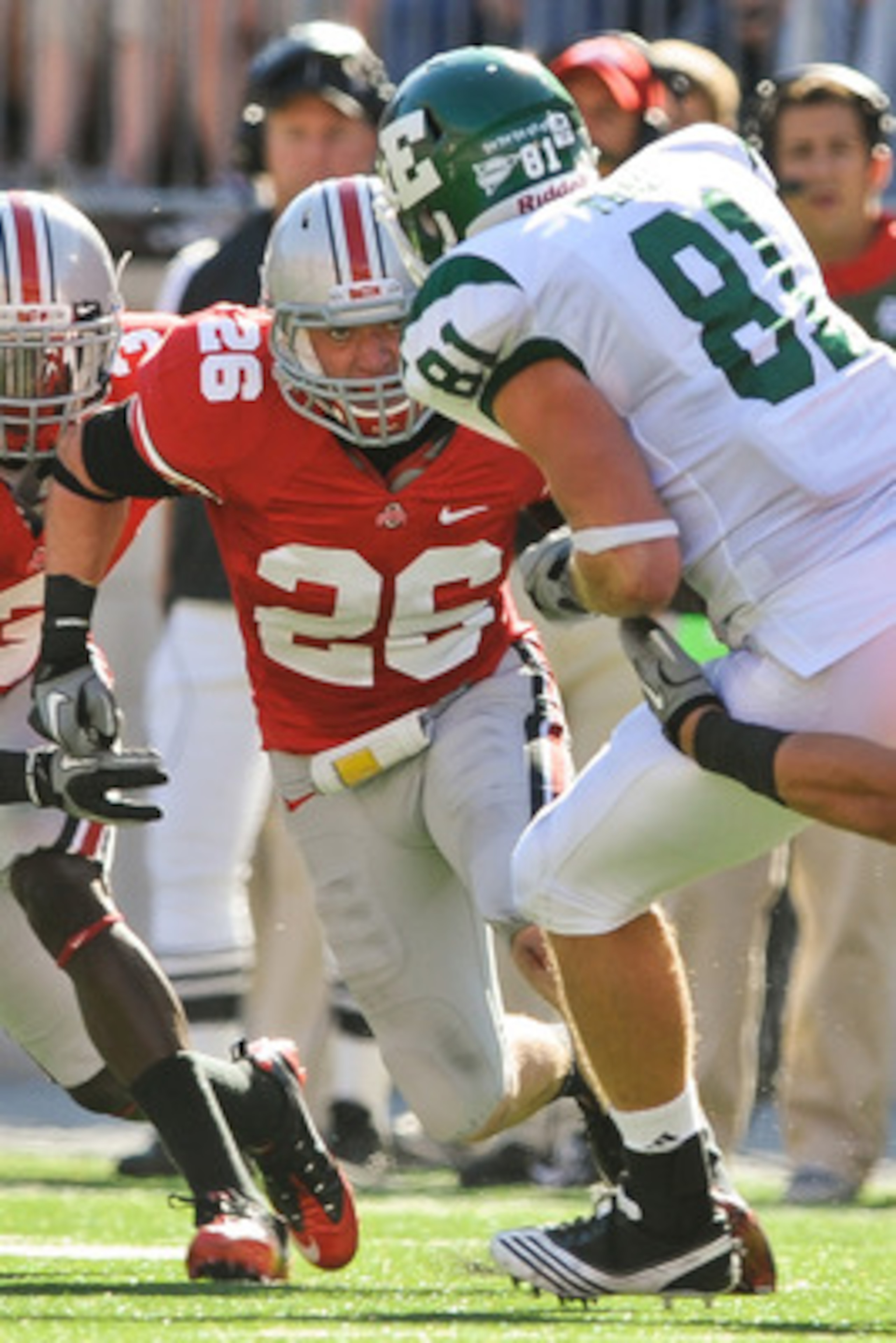COLUMBUS, OH - SEPTEMBER 25:  Tyler Moeller #26 of the Ohio State Buckeyes chases down Ben Thayer #81 of the Eastern Michigan Eagles at Ohio Stadium on September 25, 2010 in Columbus, Ohio.  Ohio State won 73-20. (Photo by Jamie Sabau/Getty Images)