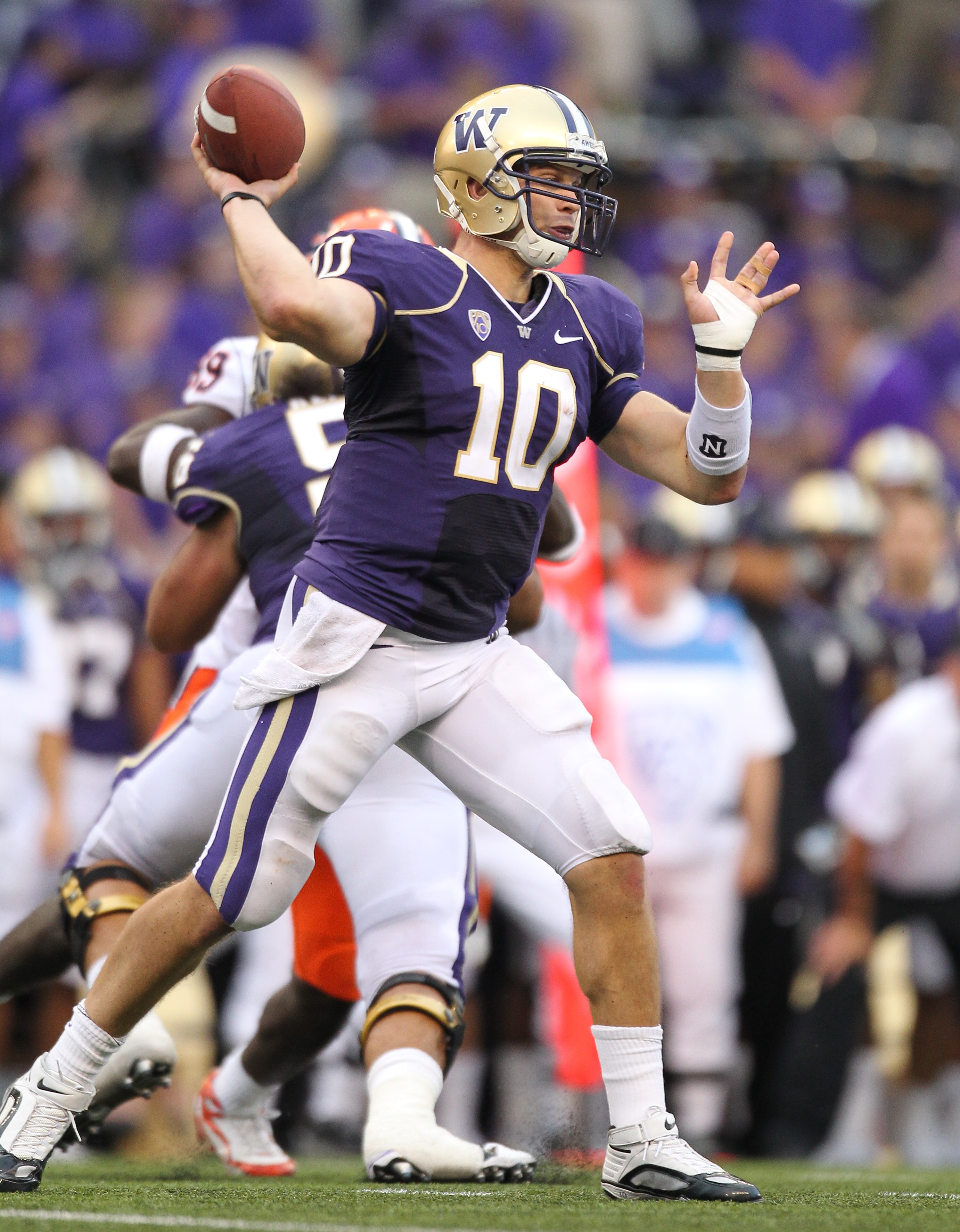 SEATTLE - SEPTEMBER 11:  Quarterback Jake Locker #10 of the Washington Huskies passes against the Syracuse Orange on September 11, 2010 at Husky Stadium in Seattle, Washington. (Photo by Otto Greule Jr/Getty Images)
