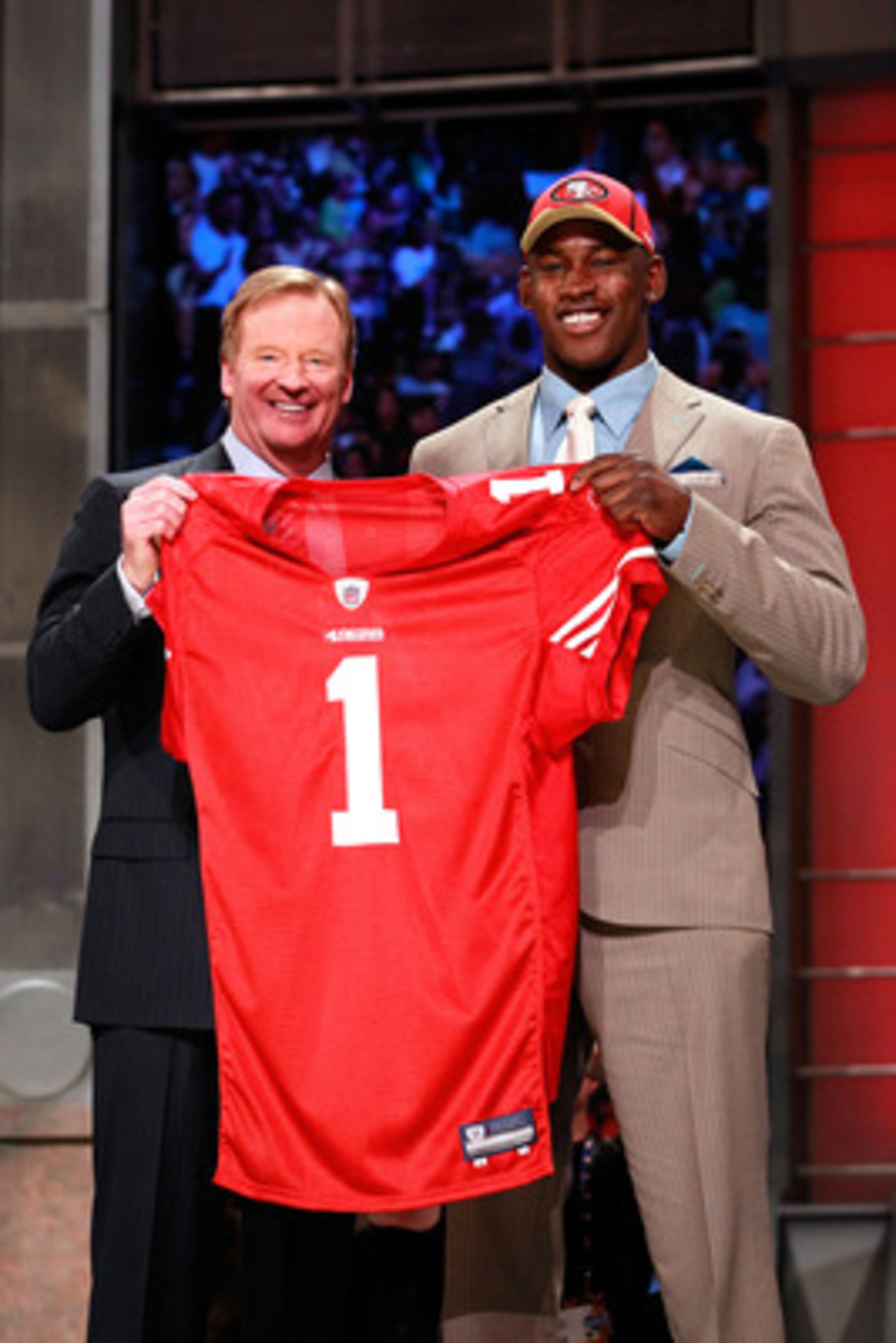 NEW YORK, NY - APRIL 28: NFL Commissoner Roger Goodell poses for a photo with Aldon Smith, #7 overall pick by the San Francisco 49ers, during the 2011 NFL Draft at Radio City Music Hall on April 28, 2011 in New York City. (Photo by Chris Trotman/Getty I NEW YORK, NY - APRIL 28: NFL Commissoner Roger Goodell poses for a photo with Aldon Smith, #7 overall pick by the San Francisco 49ers, during the 2011 NFL Draft at Radio City Music Hall on April 28, 2011 in New York City. (Photo by Chris Trotman/Getty I