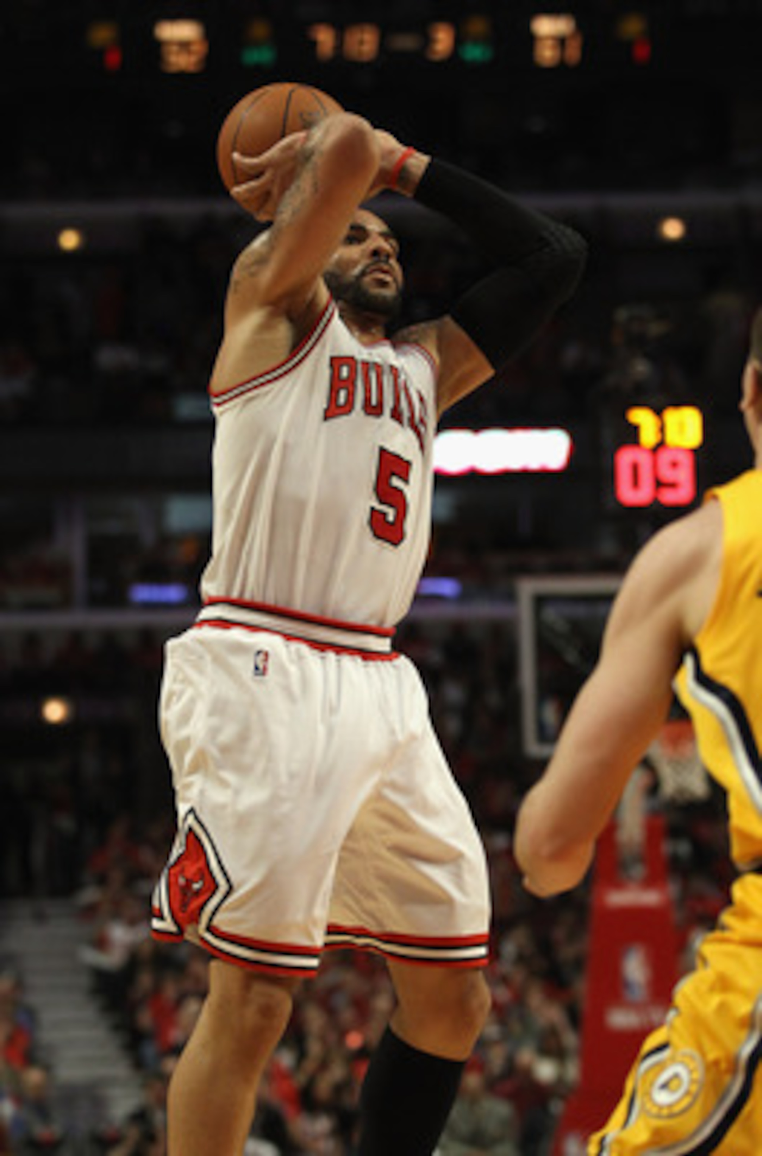 CHICAGO, IL - APRIL 26: Carlos Boozer #5 of the Chicago Bulls takes a shot against the Indiana Pacers in Game Five of the Eastern Conference Quarterfinals in the 2011 NBA Playoffs at the United Center on April 26, 2011 in Chicago, Illinois. The Bulls defe