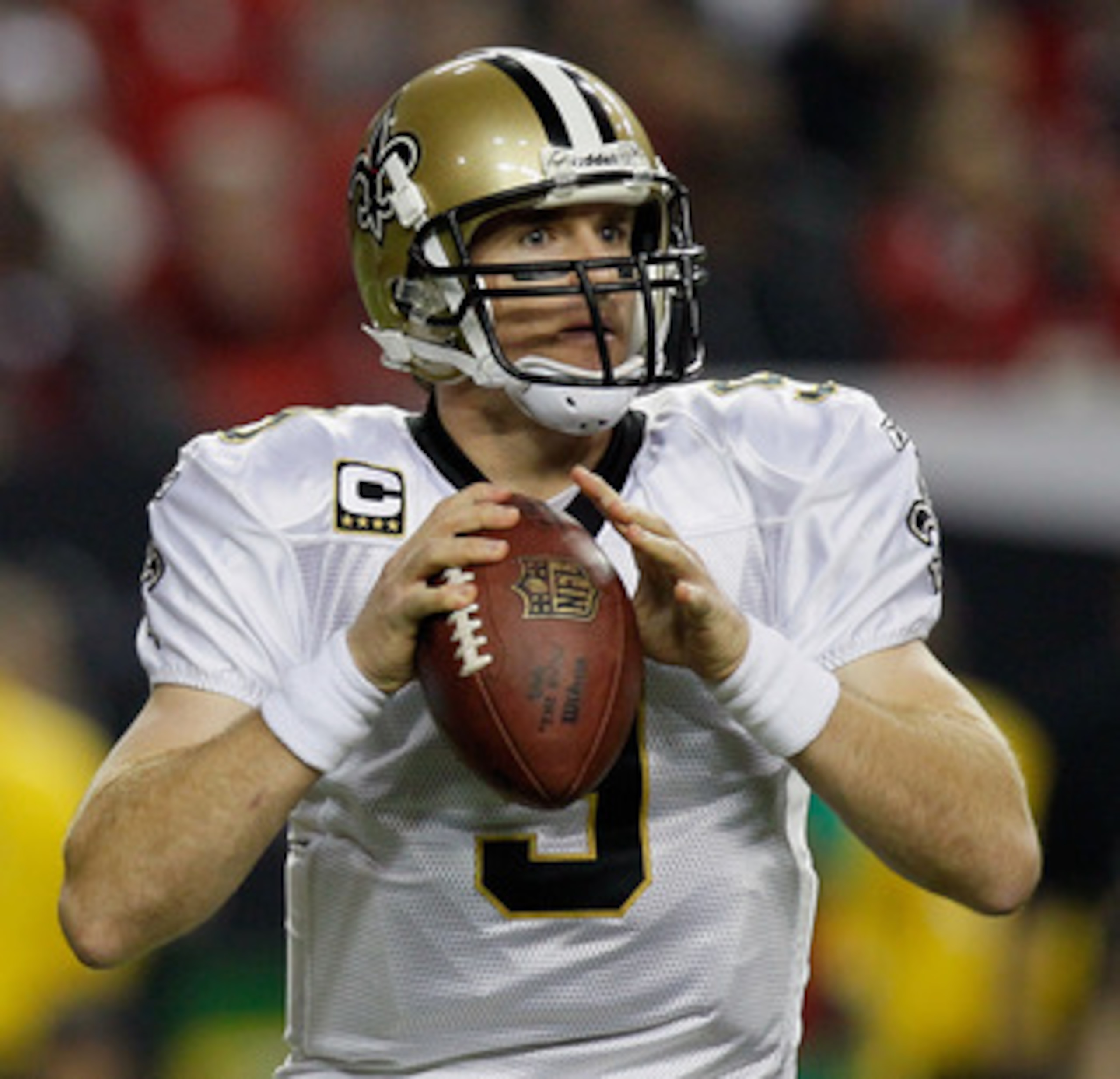ATLANTA, GA - DECEMBER 27:  Quarterback Drew Brees #9 of the New Orleans Saints looks upfield to pass in the first half during the game against the Atlanta Falcons at the Georgia Dome on December 27, 2010 in Atlanta, Georgia.  (Photo by Kevin C. Cox/Getty