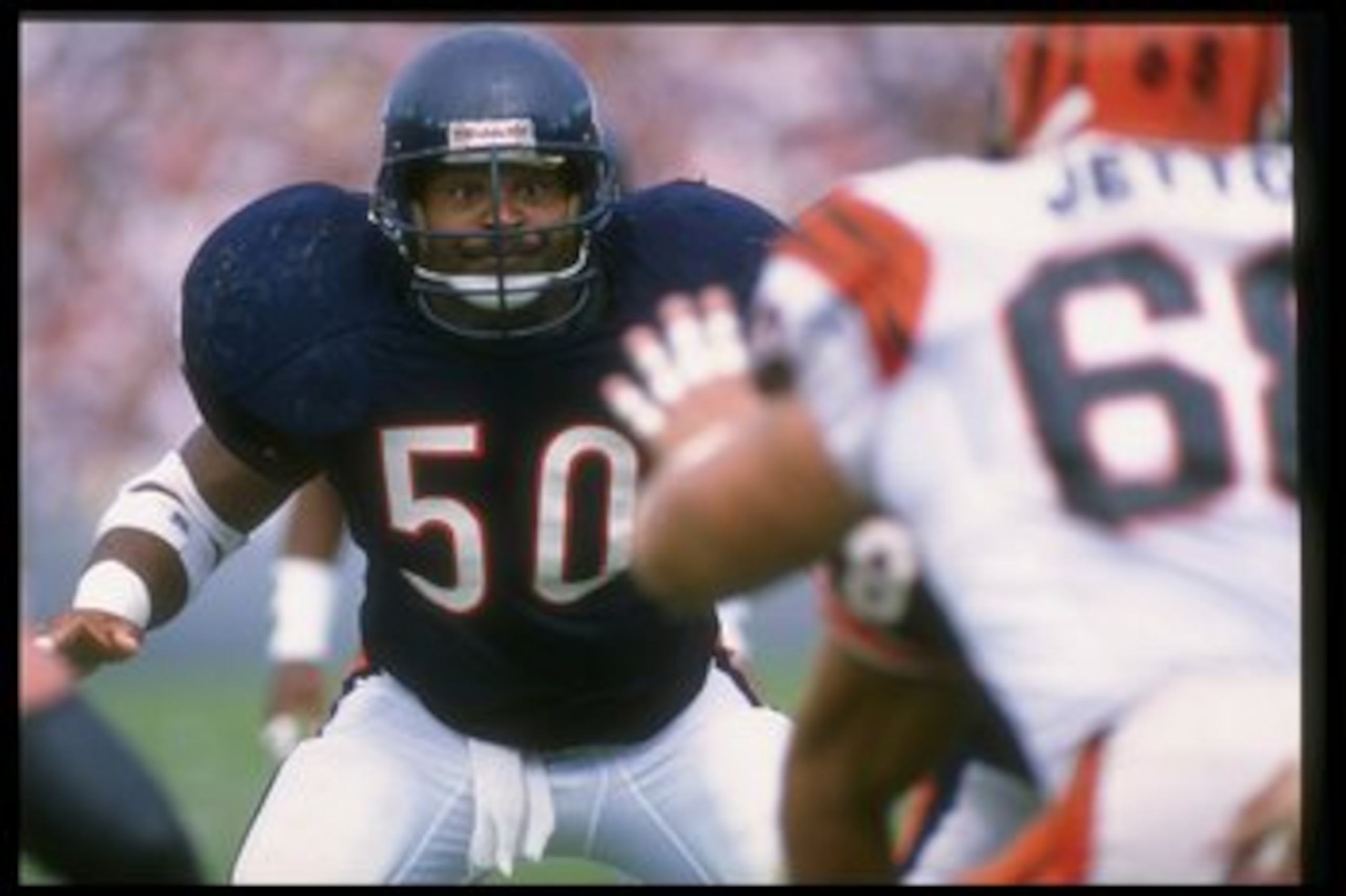 CHICAGO, IL - SEPTEMBER 10:  Linebacker Mike Singletary #50 of the Chicago Bears looks on during a game against the Cincinnati Bengals on September 10, 1989 at Soldier Field in Chicago, Illinois.  The Bears defeated the Bengals 17-14. (Photo by Jonathan D