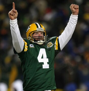 GREEN BAY, WI - JANUARY 20:  Quarterback Brett Favre #4 of the Green Bay Packers celebrates after throwing a 12 yard touchdown recption during the third quarter of the NFC championship game against the New York Giants on January 20, 2008 at Lambeau Field