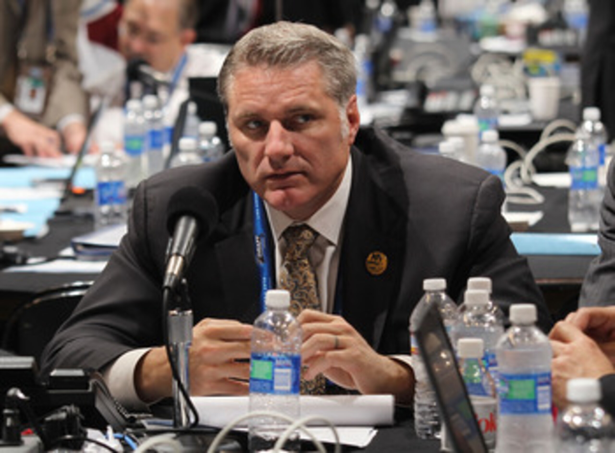 LOS ANGELES, CA - JUNE 25: Garth Snow of the New York Islanders works on the draft floor during the 2010 NHL Entry Draft at Staples Center on June 25, 2010 in Los Angeles, California.  (Photo by Bruce Bennett/Getty Images)