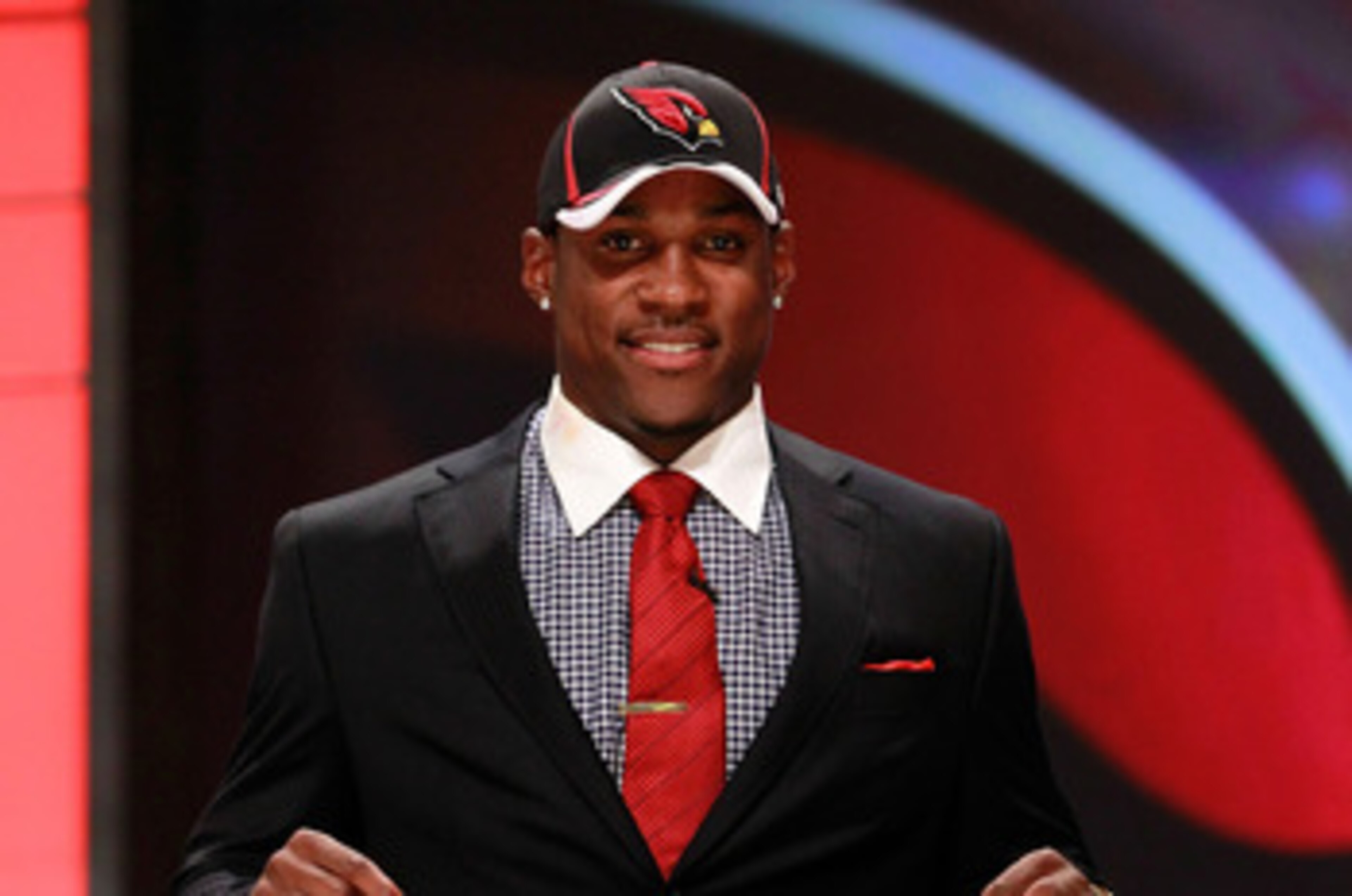 NEW YORK, NY - APRIL 28:  Patrick Peterson, #5 overall pick by the Arizona Cardinals, holds up his jersey on stage during the 2011 NFL Draft at Radio City Music Hall on April 28, 2011 in New York City.  (Photo by Chris Trotman/Getty Images)