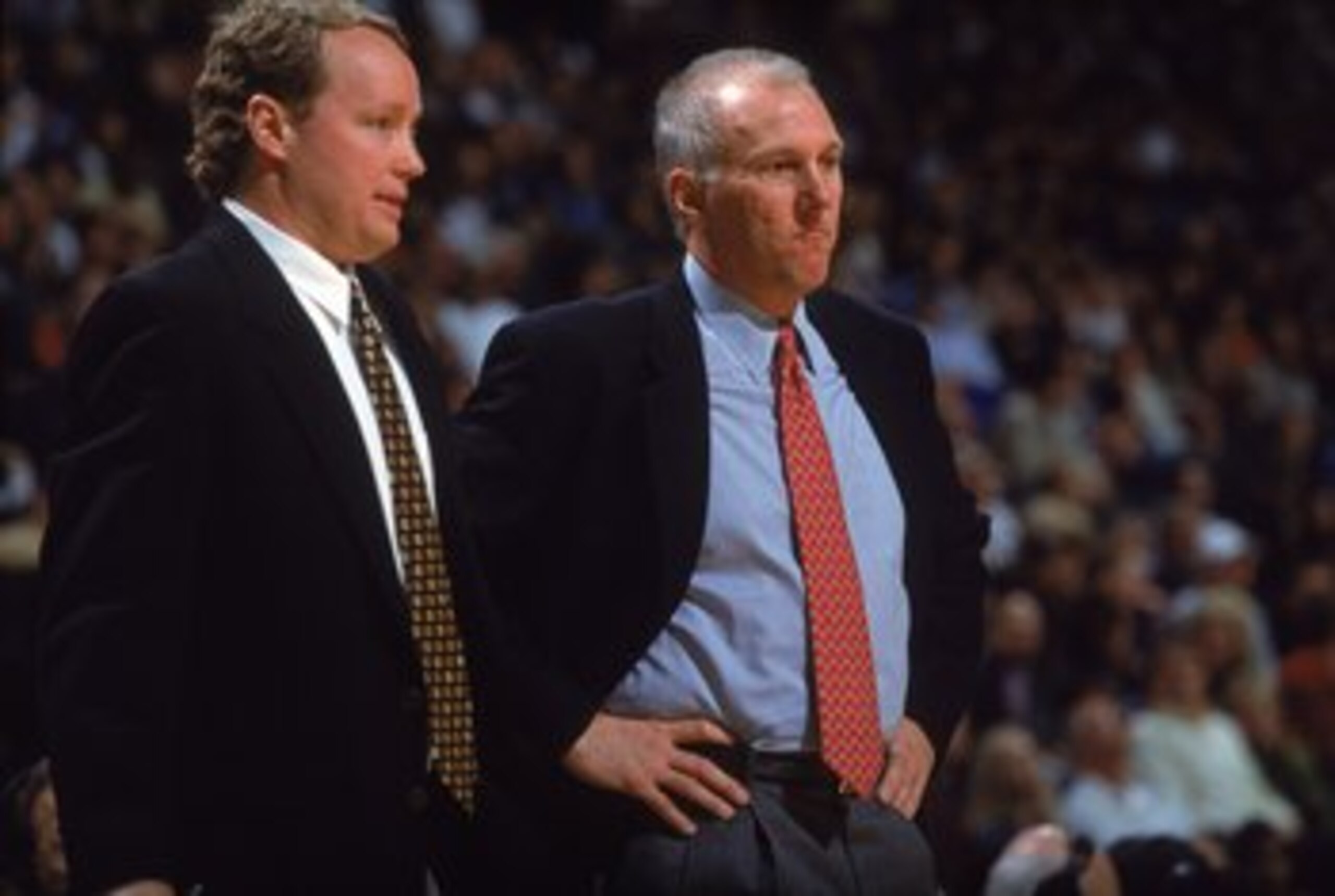 10 Nov 2000:  Head Coach Gregg Popovich of the San Antonio Spurs talks with Asst. Coach Mike Budenholzer on the sidelines during the game against the Dallas Mavericks at the Reunion Arena in Dallas, TX. The Mavericks defeated the Spurs 79-77.  NOTE TO USE