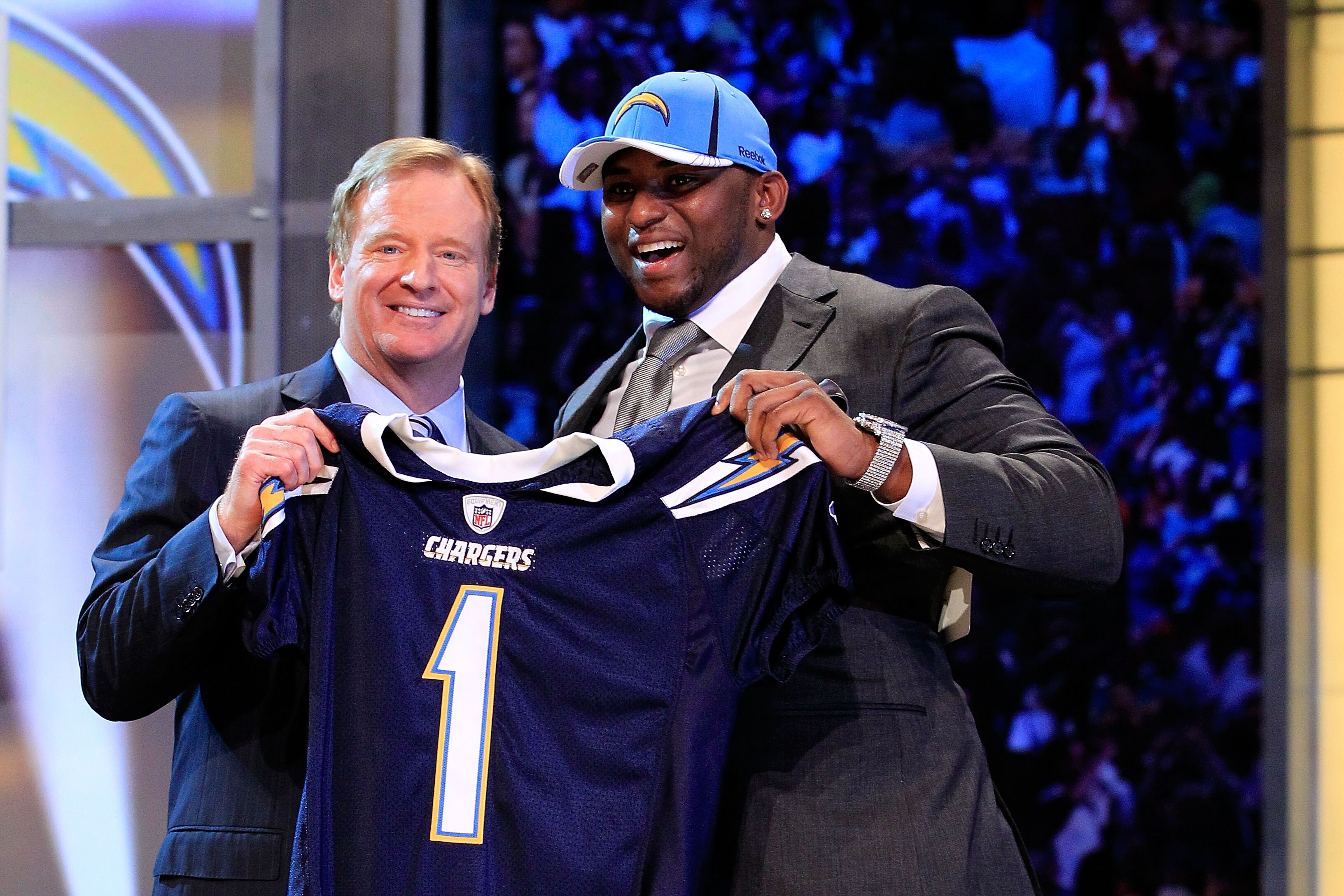 NEW YORK, NY - APRIL 28:  NFL Commissioner Roger Goodell (L) poses for a photo with Corey Liuget, #18 overall pick by the San Diego Chargers, on stage during the 2011 NFL Draft at Radio City Music Hall on April 28, 2011 in New York City.  (Photo by Chris