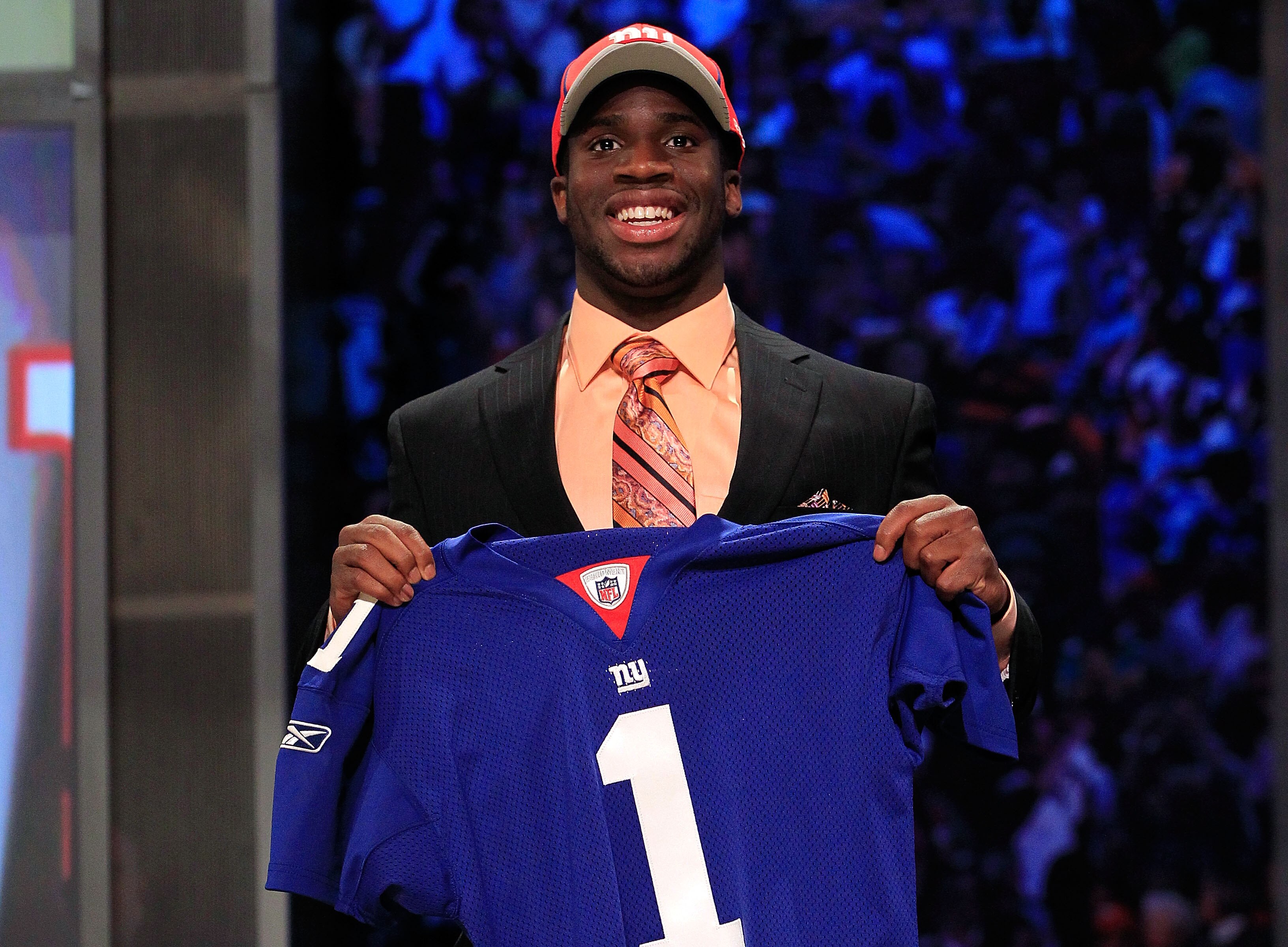 NEW YORK, NY - APRIL 28:  Prince Amukamara, #19 overall pick by the New York Giants, holds up a jersey on stage during the 2011 NFL Draft at Radio City Music Hall on April 28, 2011 in New York City.  (Photo by Chris Trotman/Getty Images)