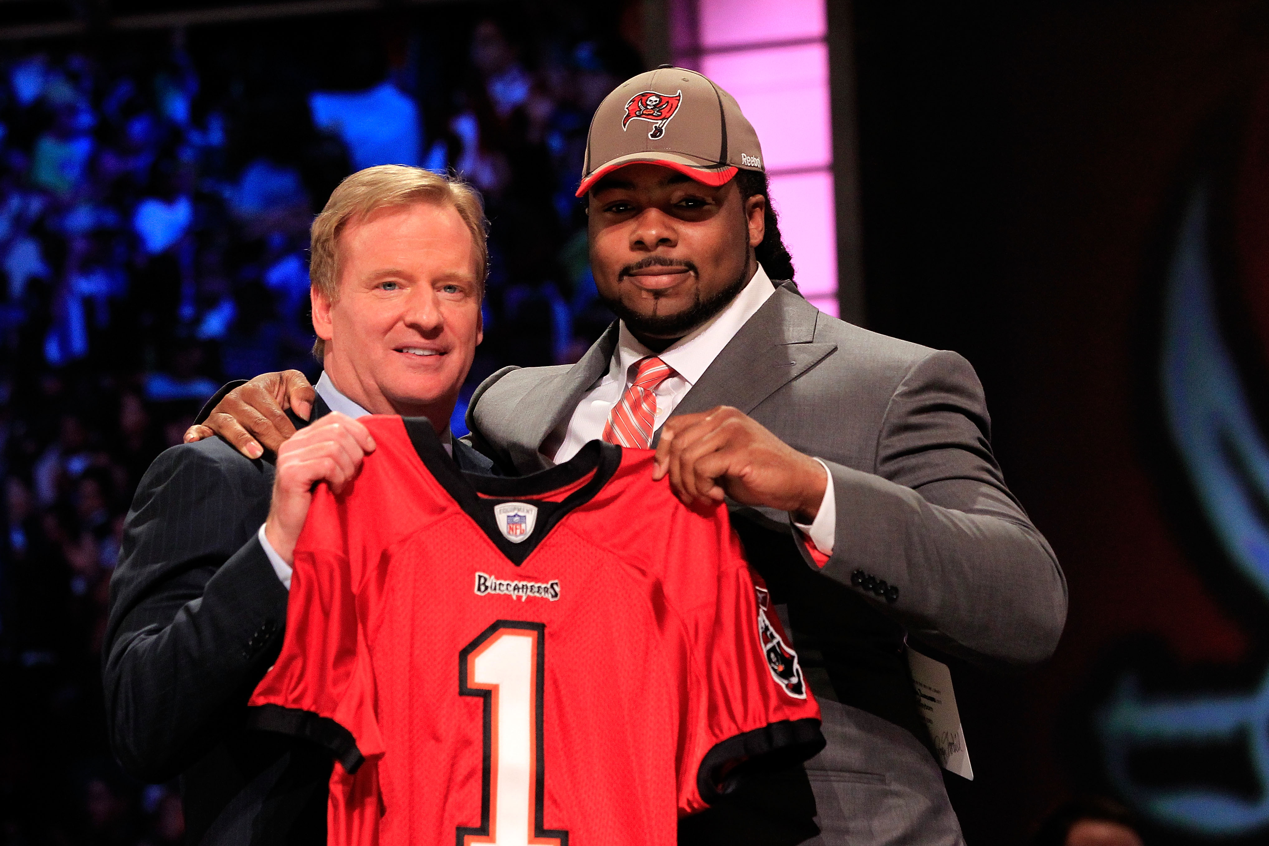 NEW YORK, NY - APRIL 28:  NFL Commissioner Roger Goodell poses for a phot with Adrian Clayborn, #20 overall pick by the Tampa Bay Buccaneers, on stage during the 2011 NFL Draft at Radio City Music Hall on April 28, 2011 in New York City.  (Photo by Chris