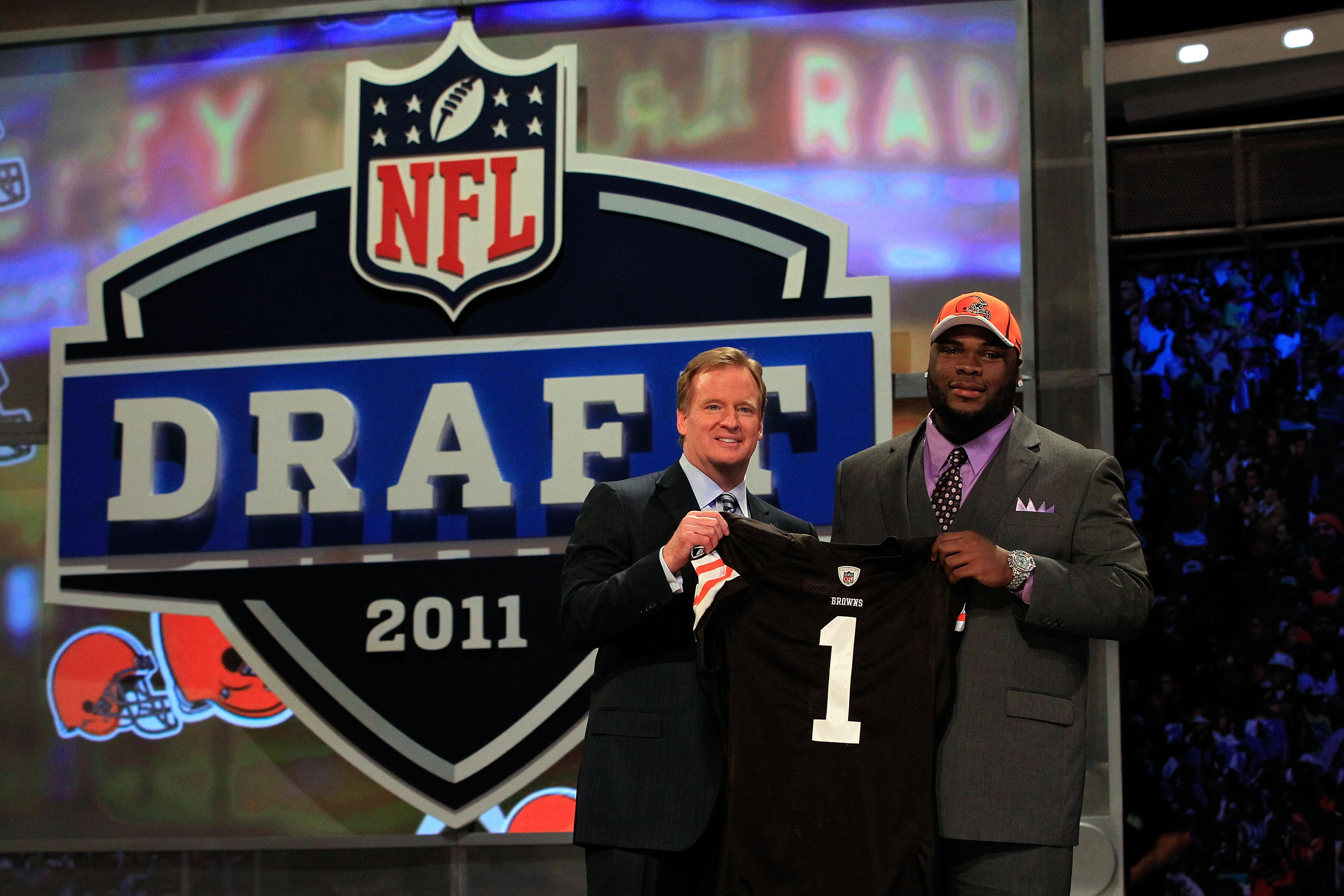 NEW YORK, NY - APRIL 28:  NFL Commissioner ROger Goodell (L) poses for a photo with Phil Taylor, #21 overall pick by the Cleveland Browns, on stage during the 2011 NFL Draft at Radio City Music Hall on April 28, 2011 in New York City.  (Photo by Chris Tro