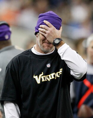 DETROIT - DECEMBER 13:  Quarterback Brett Favre #4 of the Minnesota Vikings covers his face with his hand during the game against the New York Giants at Ford Field on December 13, 2010 in Detroit, Michigan. The Giants defeated the Vikings 21-3.  (Photo by