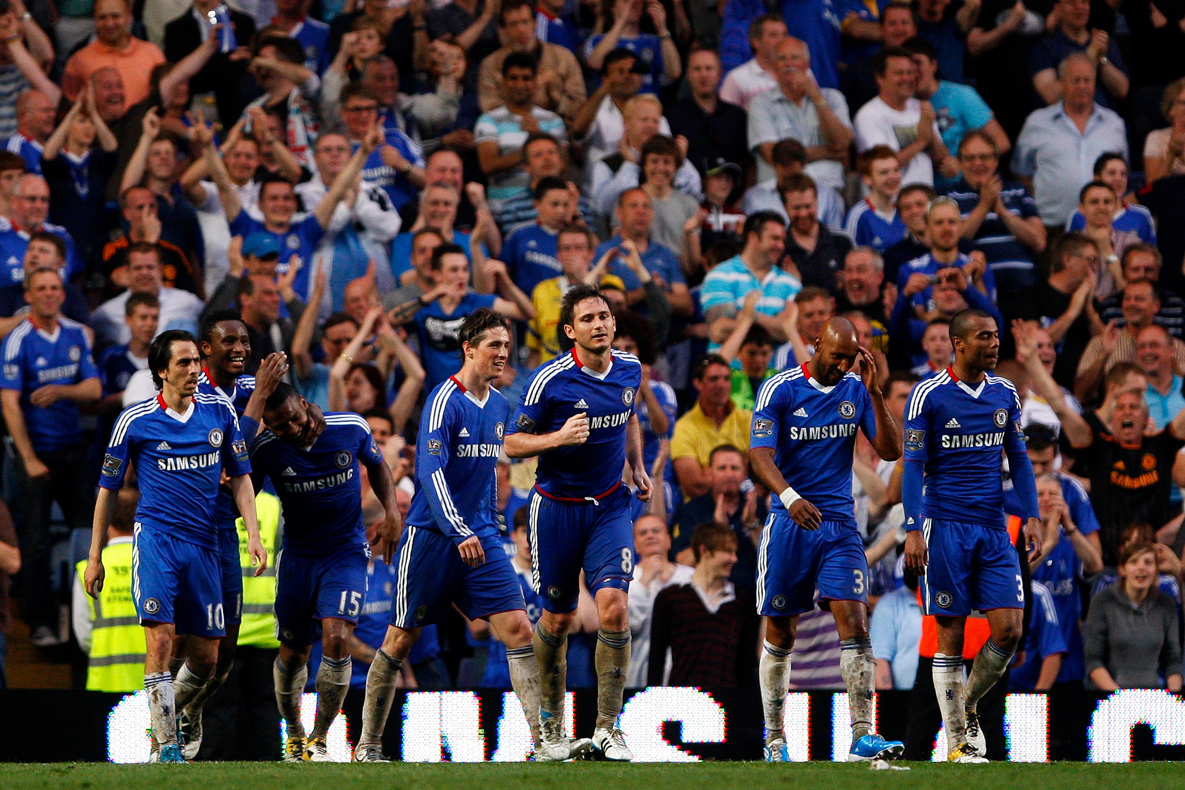 LONDON, ENGLAND - APRIL 23:  Florent Malouda (3rd L) of Chelsea celebrates with his team mates after scoring his team's third goal during the Barclays Premier League match between Chelsea and West Ham United at Stamford Bridge on April 23, 2011 in London,