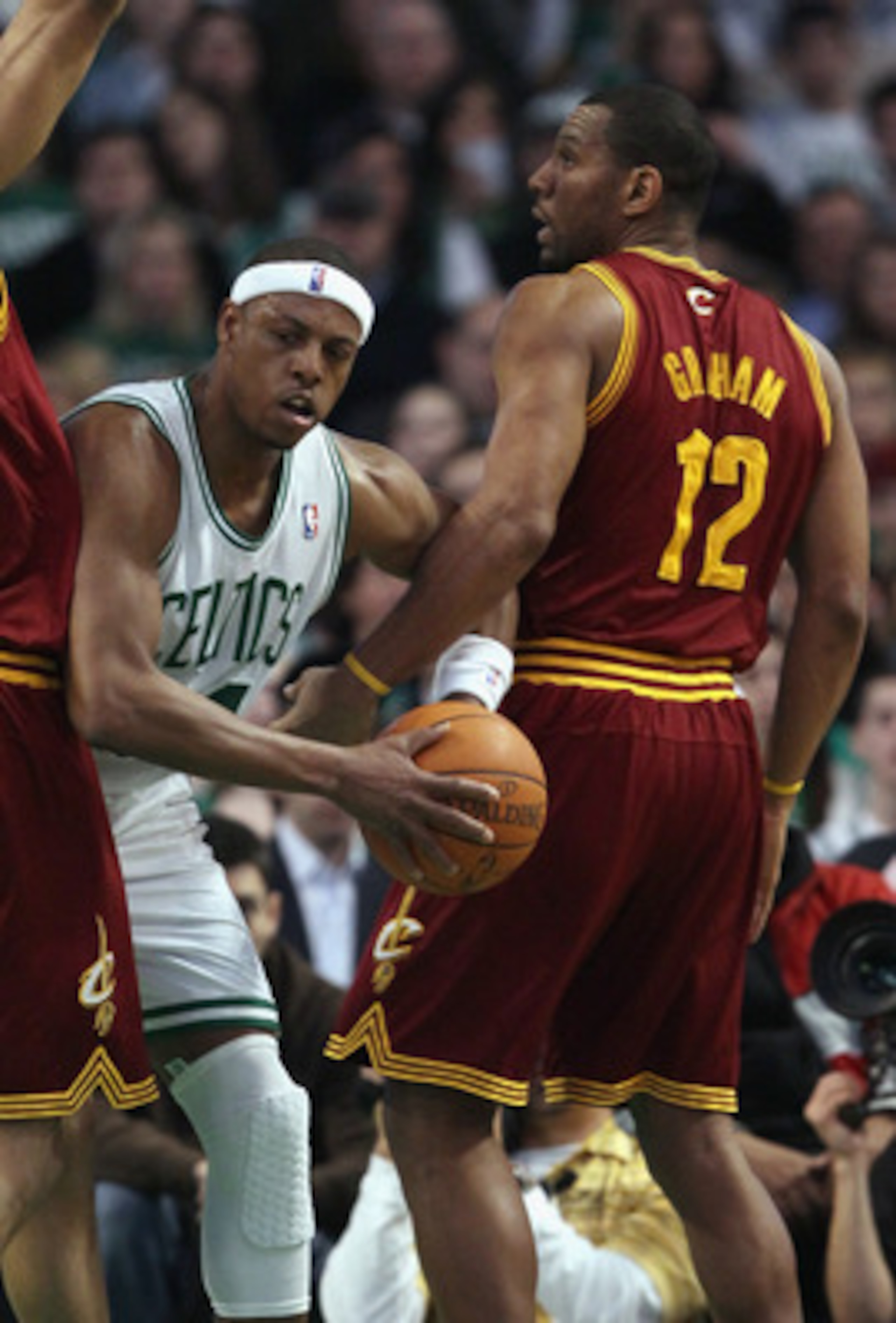BOSTON, MA - JANUARY 25:  Paul Pierce #34 of the Boston Celtics tries to get through Ryan Hollins #5 and Joey Graham #12 of the of the Cleveland Cavaliers on January 25, 2011 at the TD Garden in Boston, Massachusetts.   NOTE TO USER: User expressly acknow