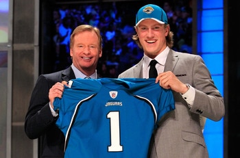 NEW YORK, NY - APRIL 28:  NFL Commissoner Roger Goodell poses for a photo with Blaine Gabbert, #11 overall pick by the Jacksonville Jaguars, holds up a jersey during the 2011 NFL Draft at Radio City Music Hall on April 28, 2011 in New York City.  (Photo b